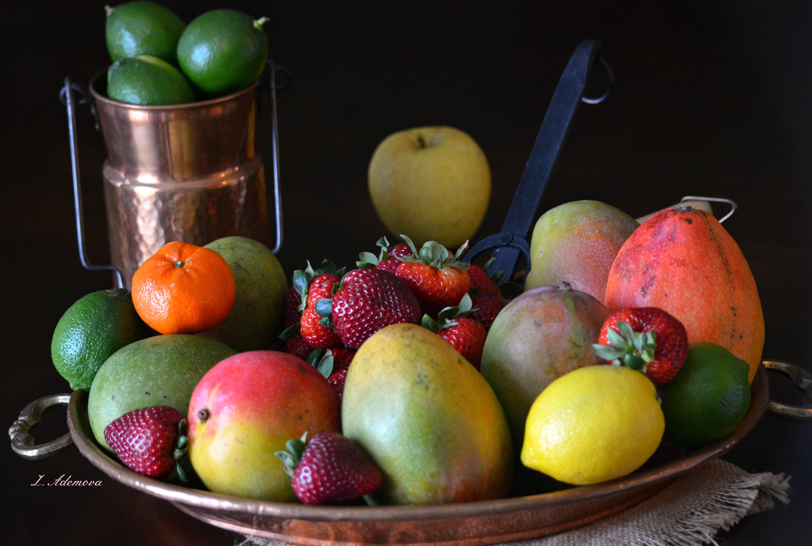 Fruit platter with mangoes, strawberries, lemons, limes, and tangerine HD Wallpaper