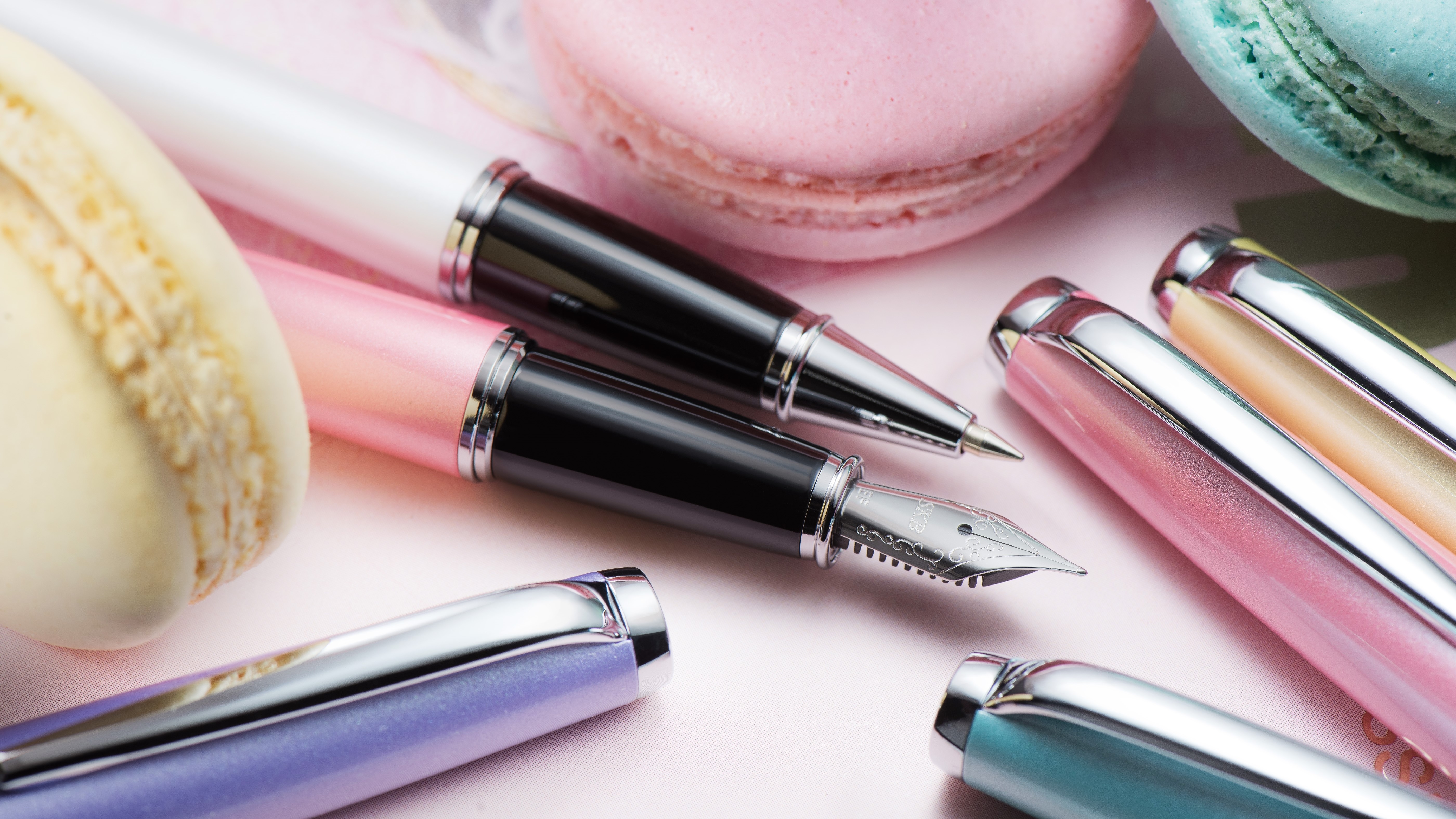 Assorted Pens and Macarons HD Wallpaper