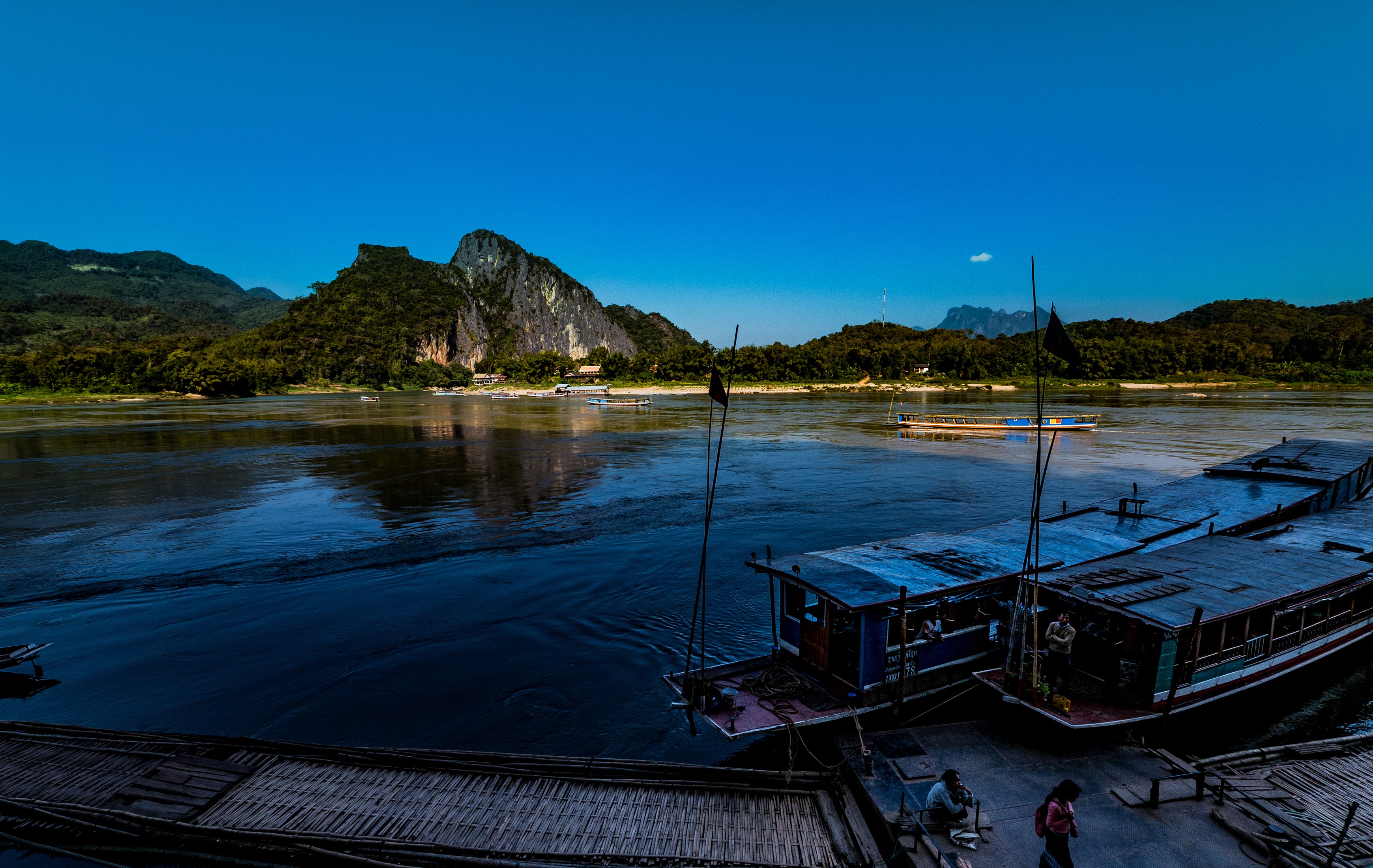 Boats on the Mekong River near Luang Prabang, Laos HD Wallpaper