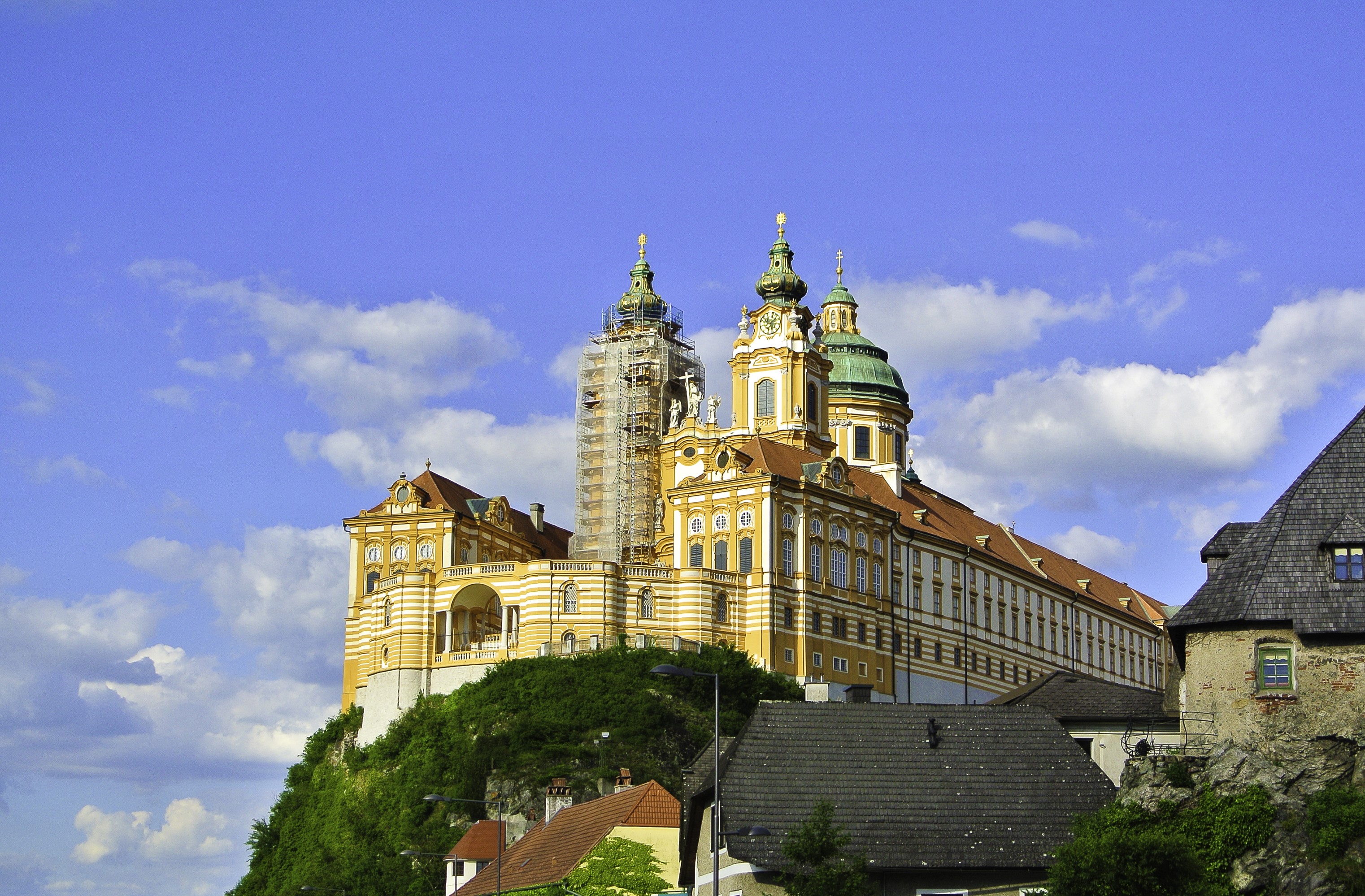 Melk Abbey Monastery in Austria under a blue sky HD Wallpaper
