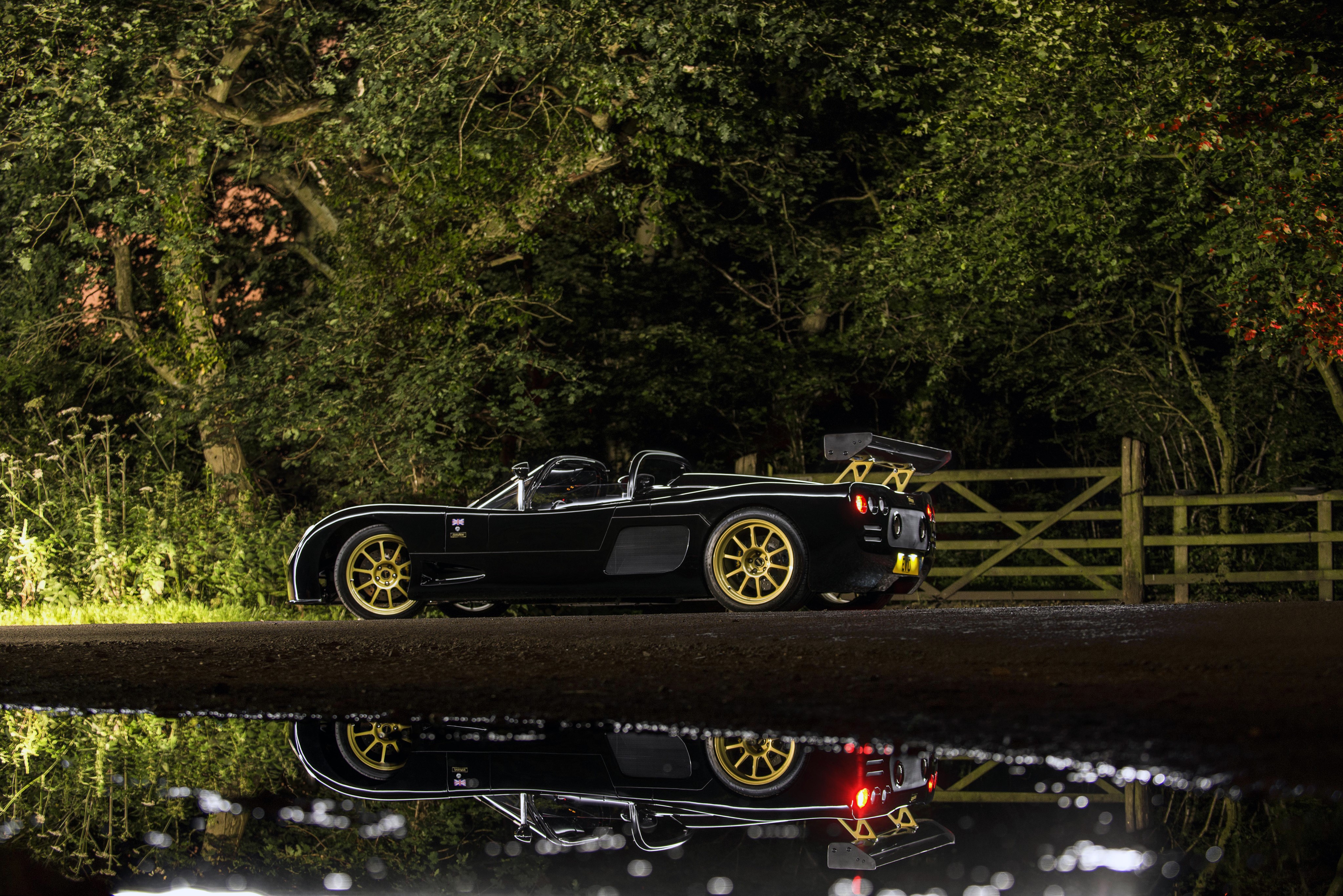 Black 2015-17 Ultima Evolution Convertible Side View HD Wallpaper