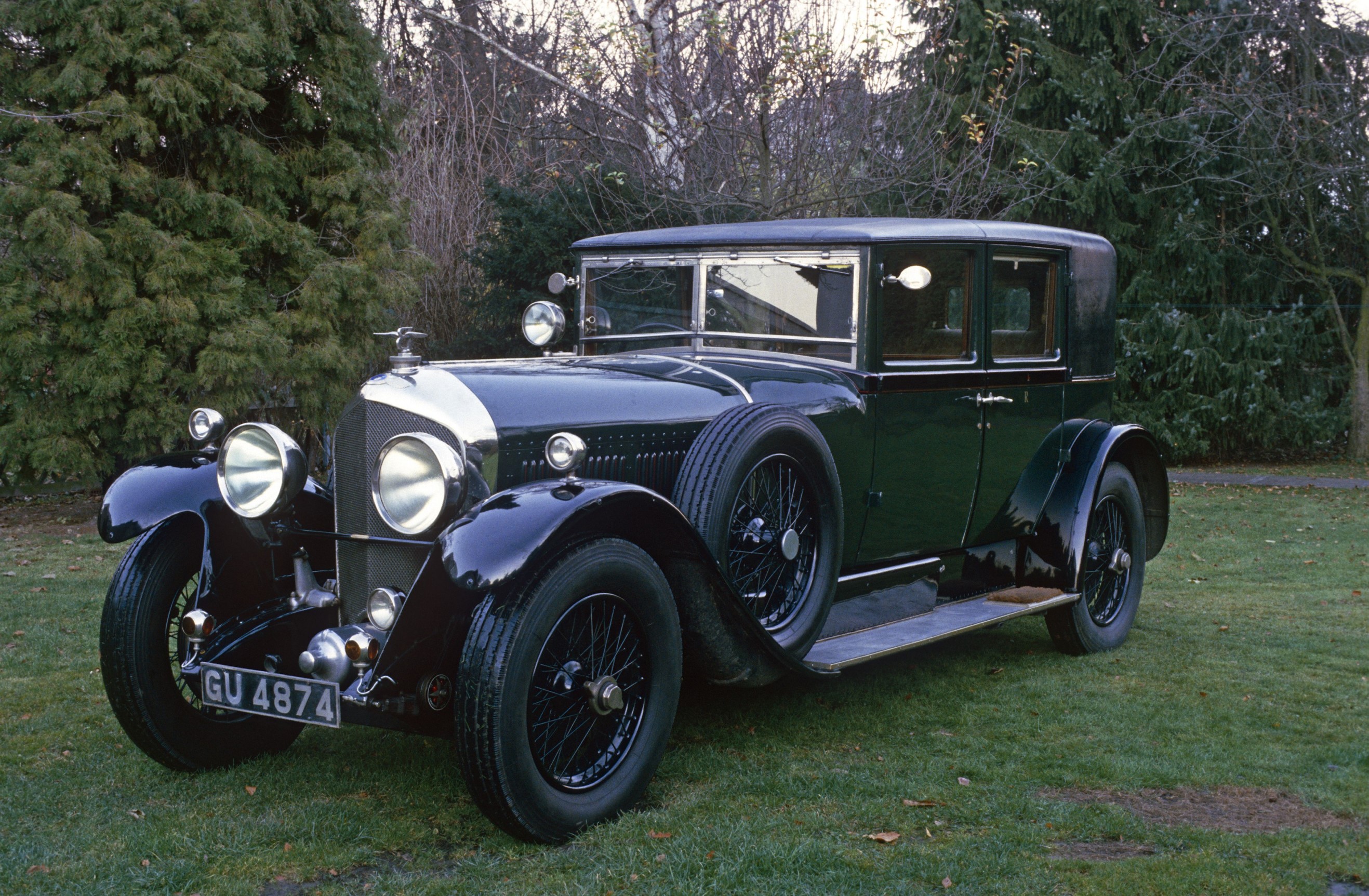 Vintage Bentley car parked on grass HD Wallpaper