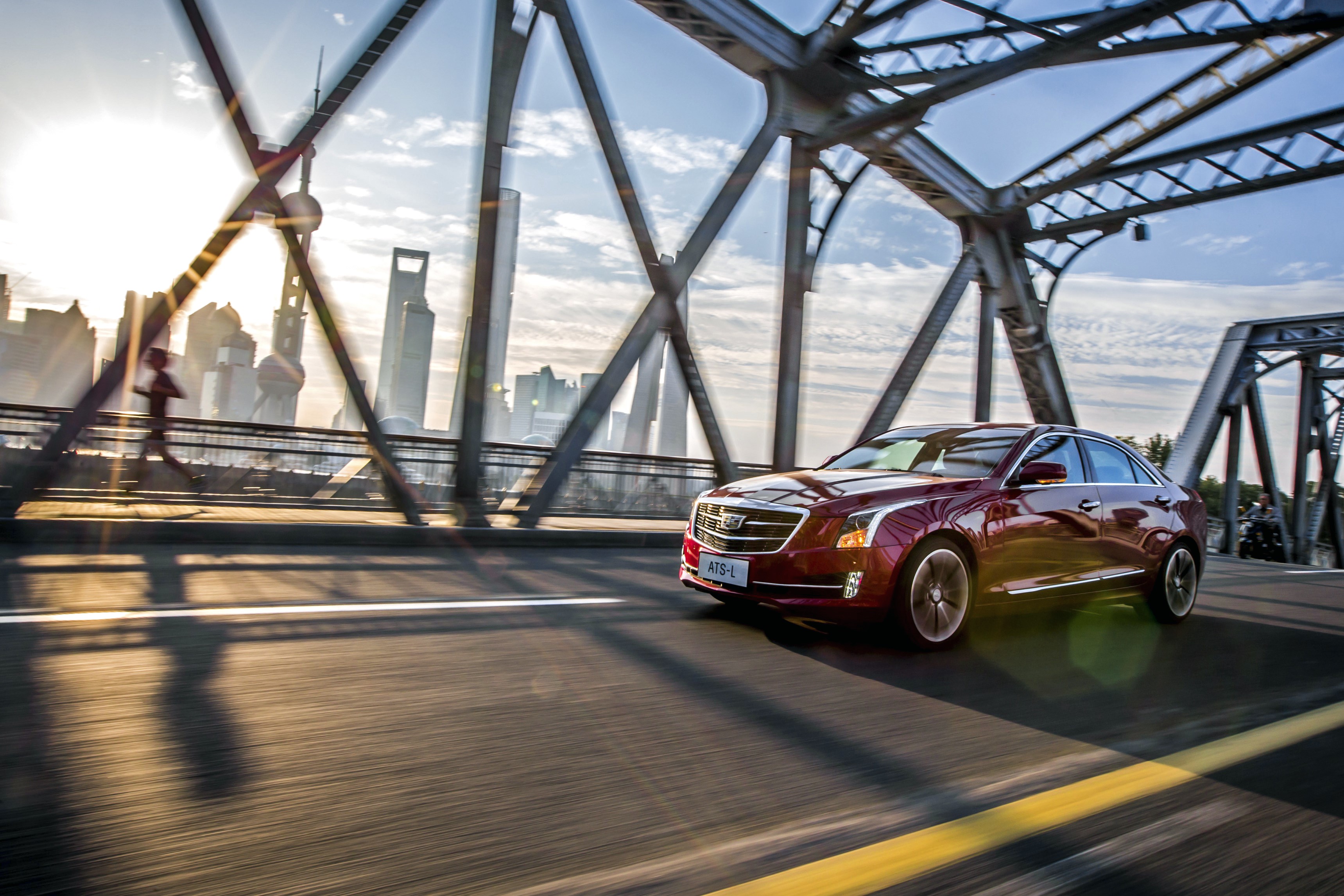 Red Cadillac ATS-L driving on a bridge in Shanghai HD Wallpaper