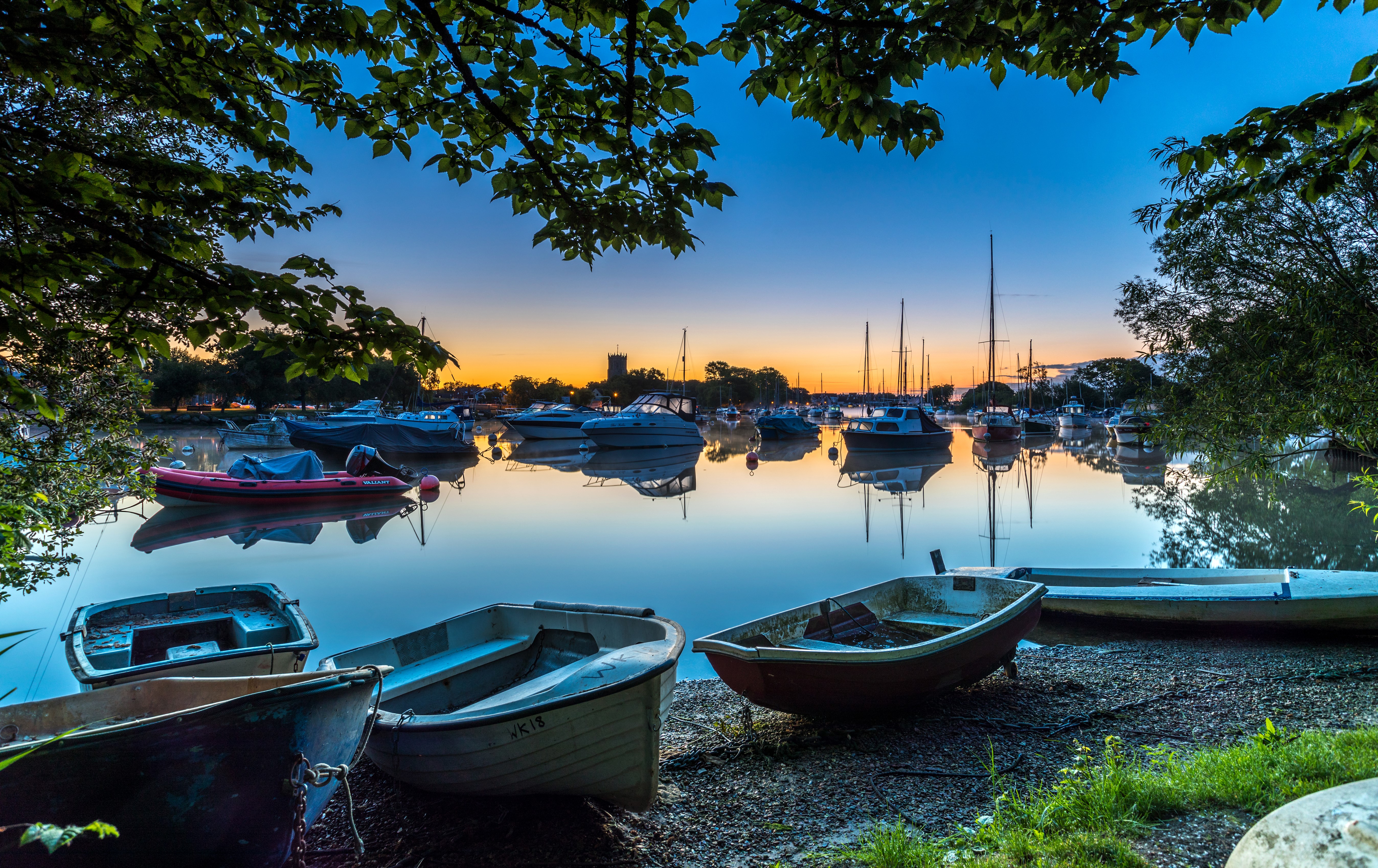 Boats in a harbor at sunset, England HD Wallpaper