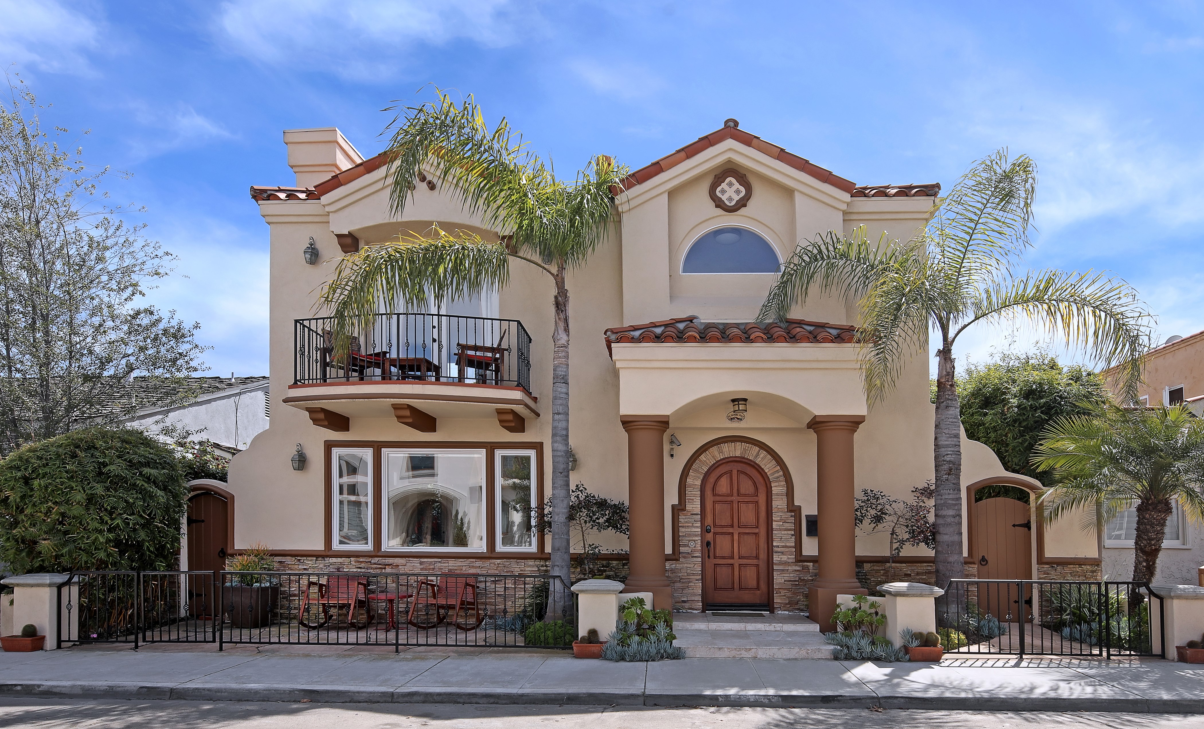 Spanish Style House with Palm Trees and Fence HD Wallpaper