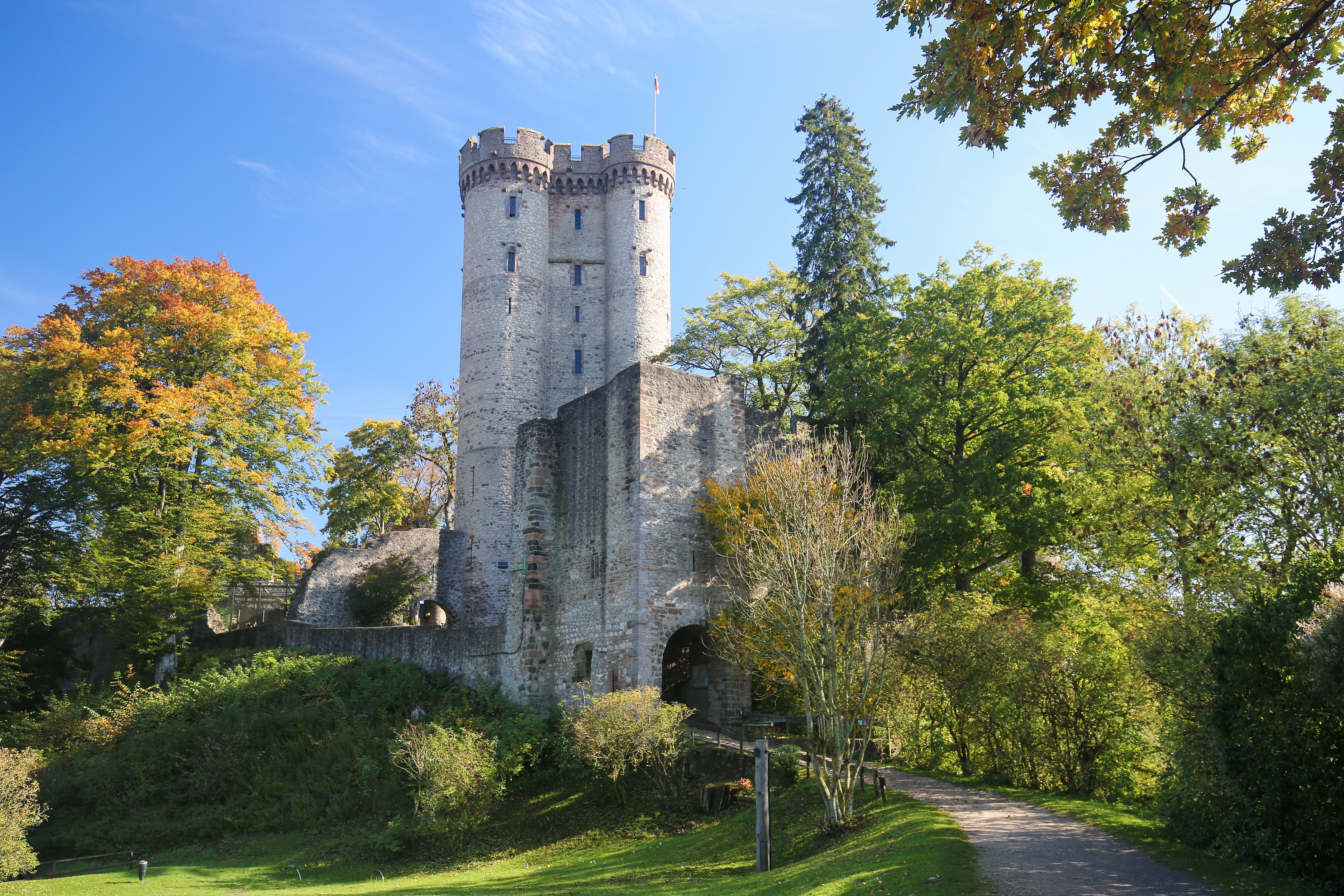 Kasselburg Castle in Vulkaneifel, Germany with autumn trees HD Wallpaper