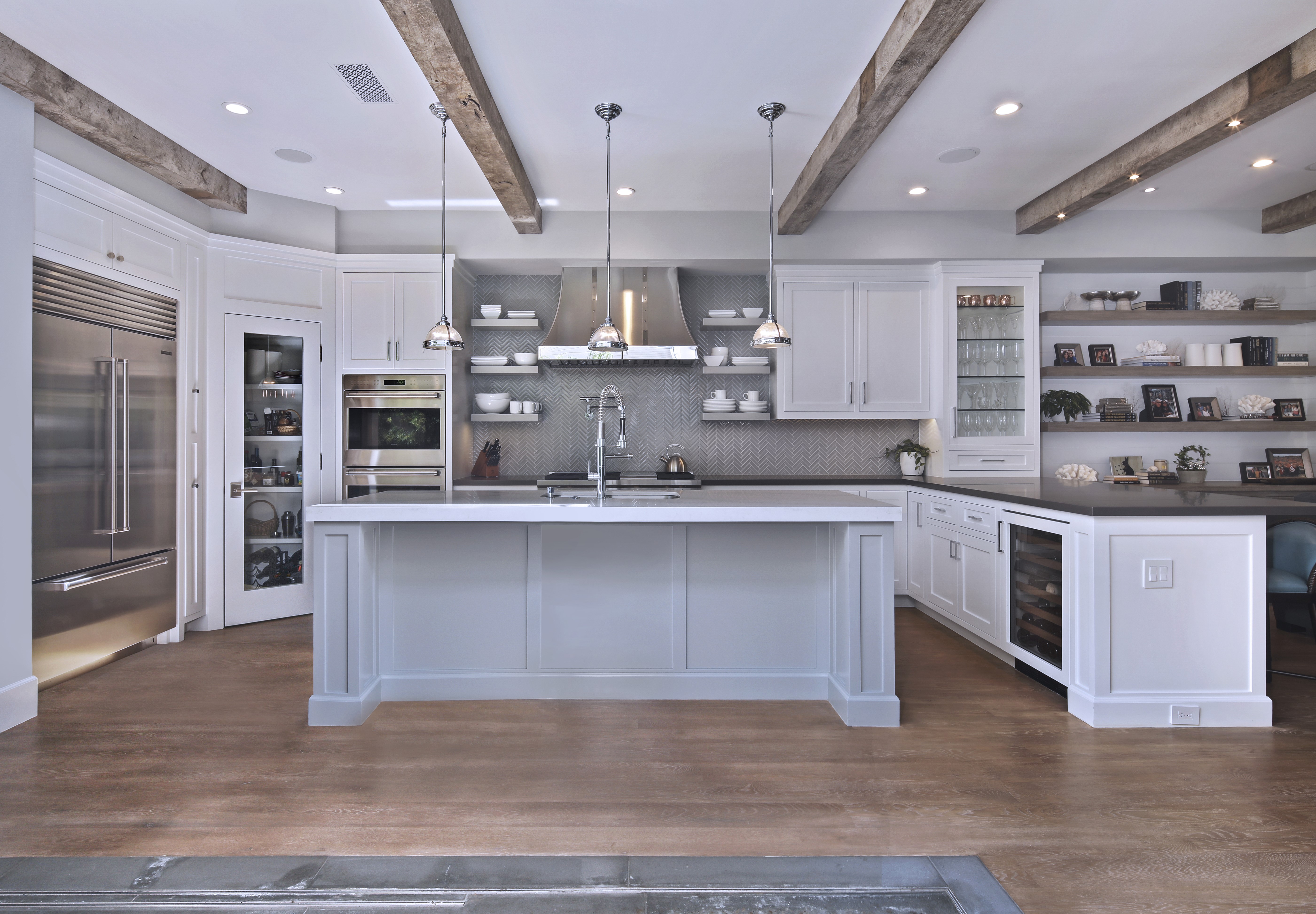 Modern Kitchen with Island and Stainless Steel Appliances HD Wallpaper