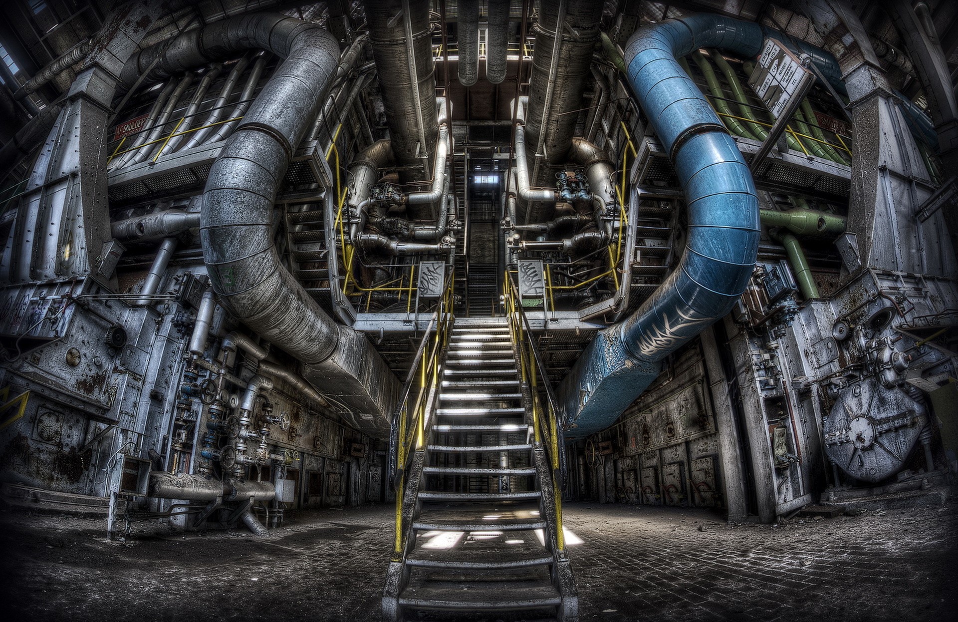 Industrial Factory Interior with Large Pipes and Stairs HD Wallpaper