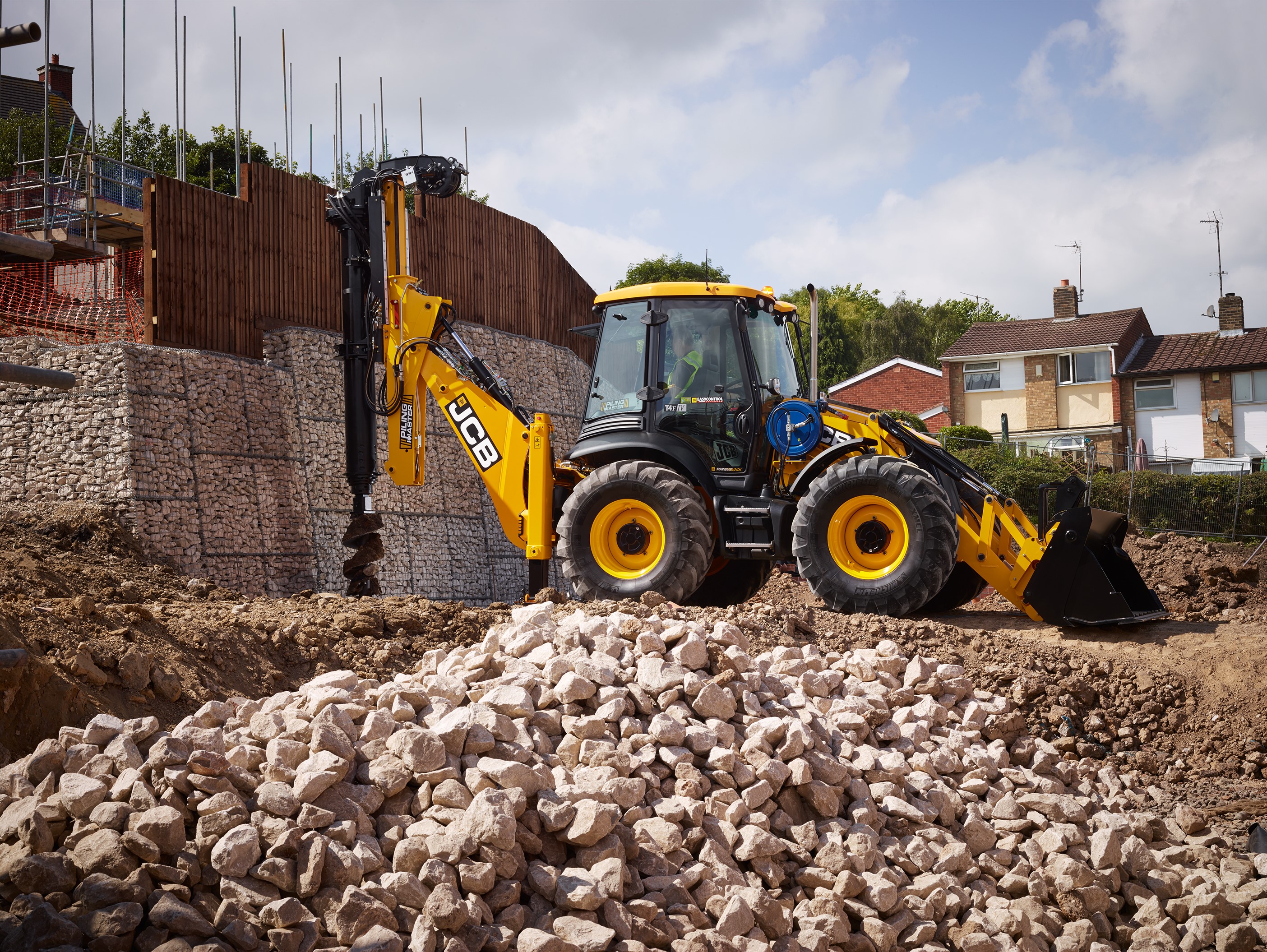 JCB 4CX PilingMaster digging with auger HD Wallpaper