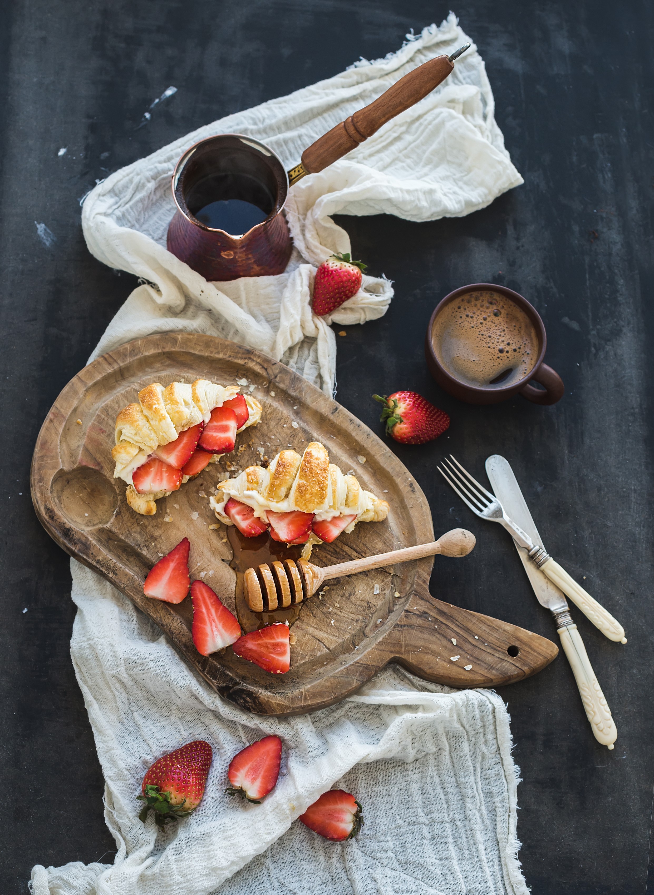 Croissants with strawberries and coffee on a wooden board HD Phone Wallpaper