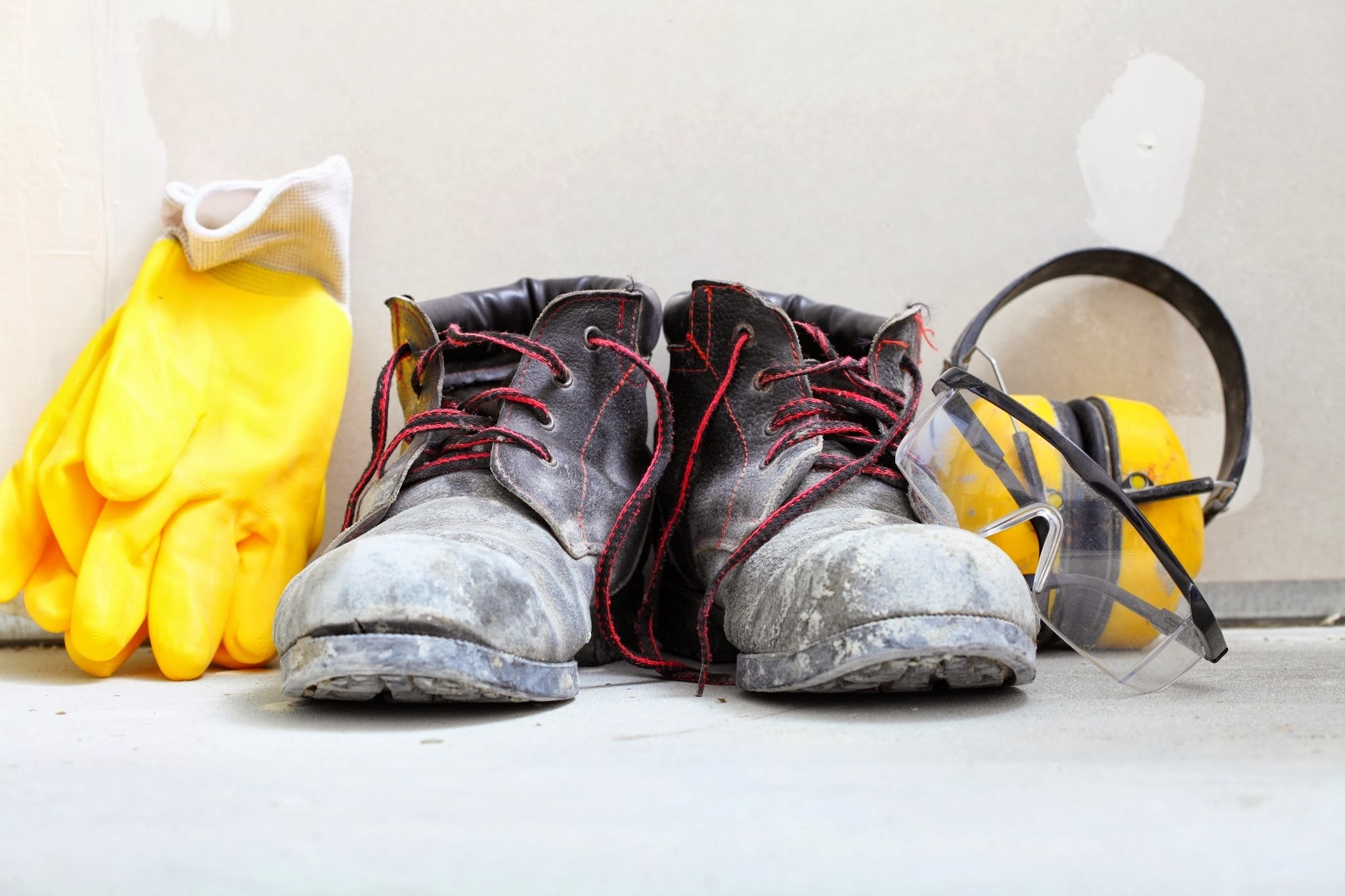 Work boots, yellow gloves, safety glasses, and headphones HD Wallpaper