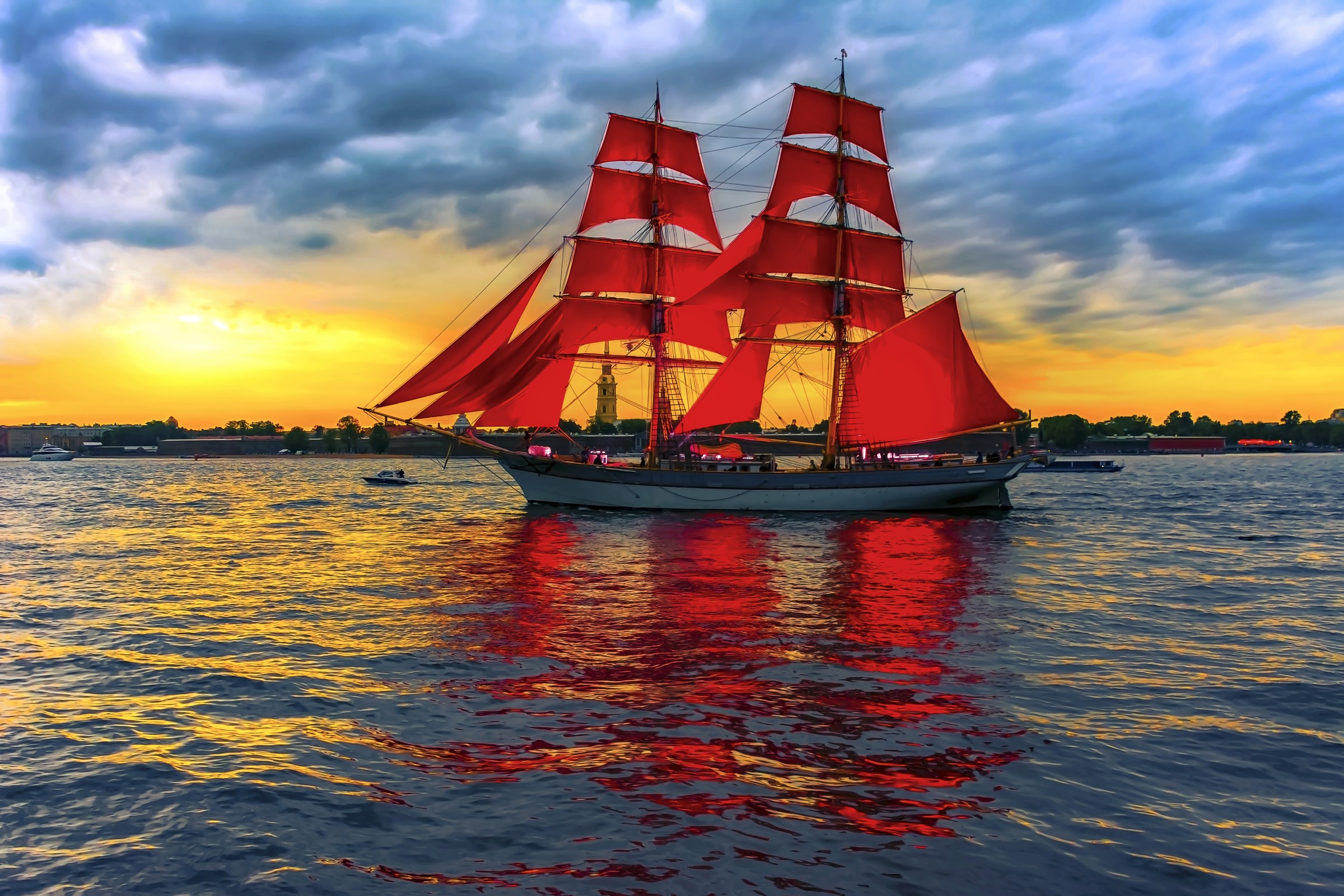 Tall ship with red sails on the water at sunset HD Wallpaper