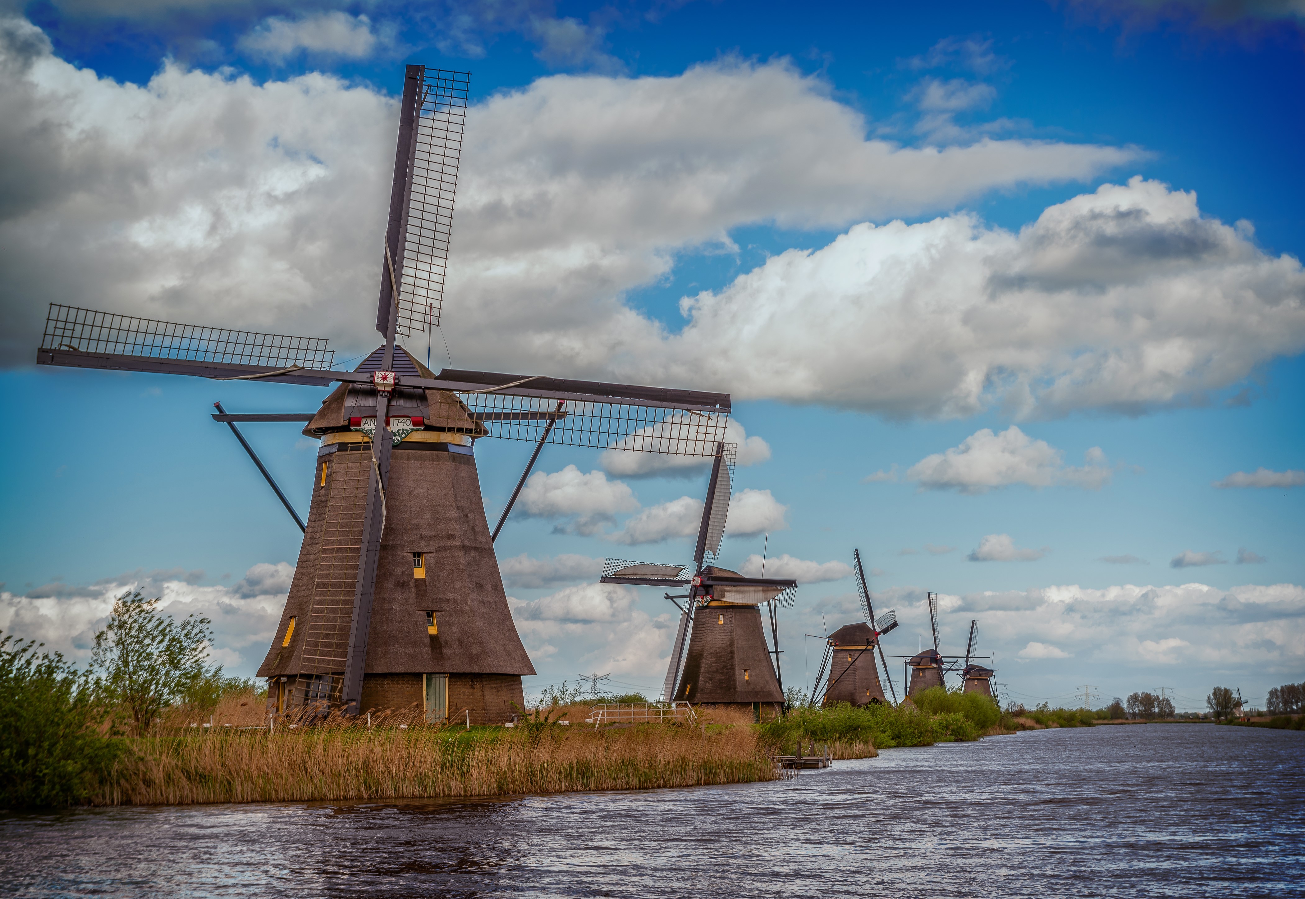 4K Kinderdijk Windmills Netherlands River Sky Clouds HD Wallpaper