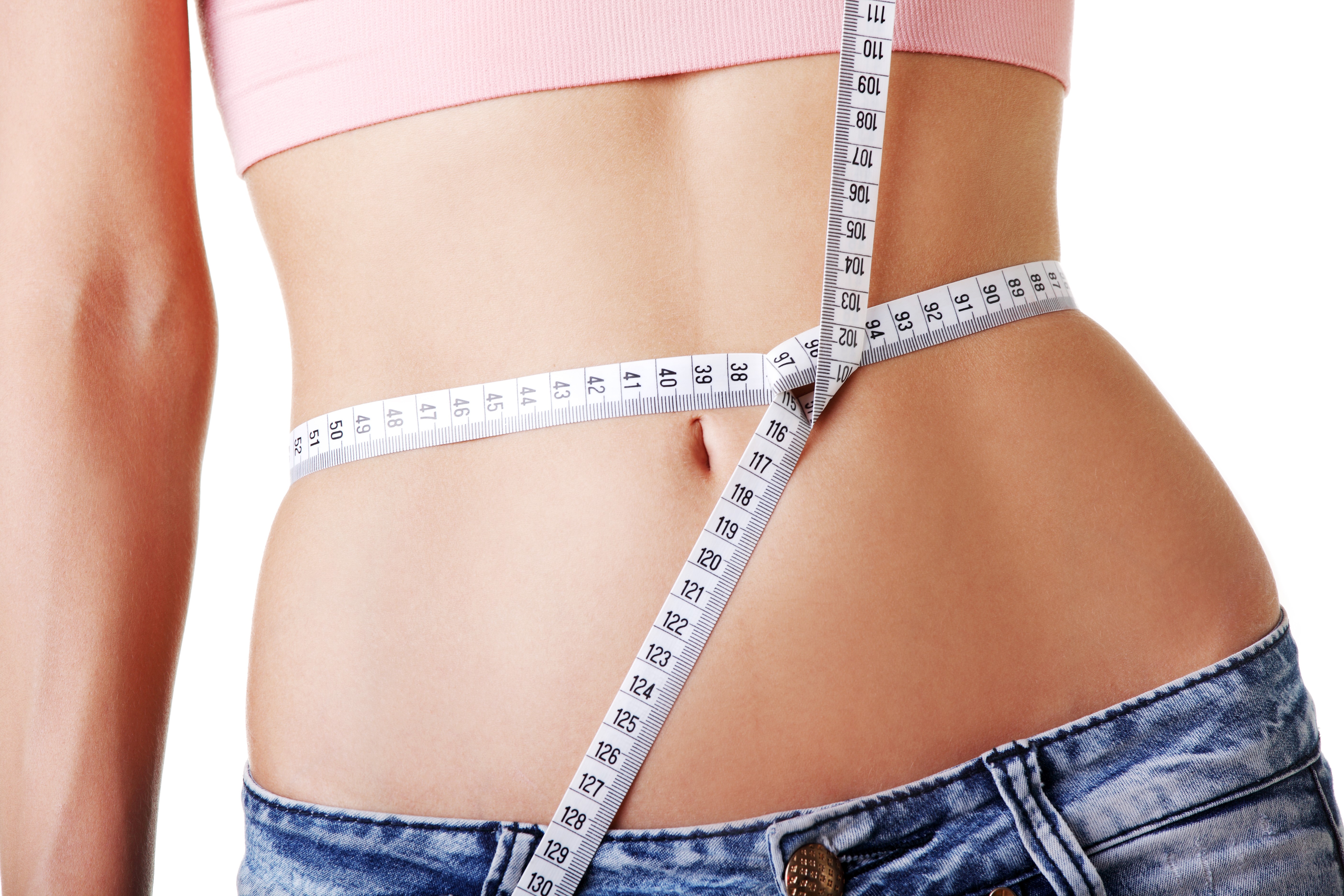 Woman measuring waist with tape measure HD Wallpaper