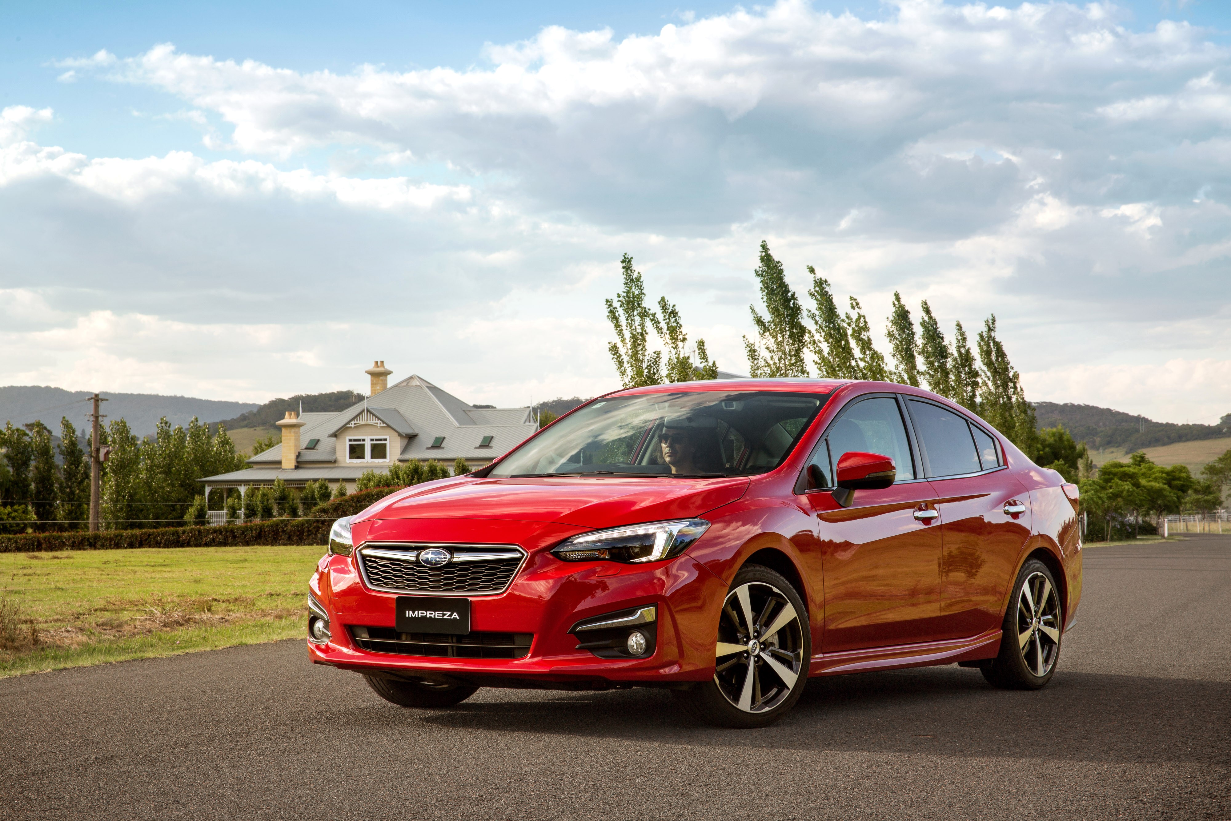 Red Subaru Impreza Sedan 2.0i HD Wallpaper