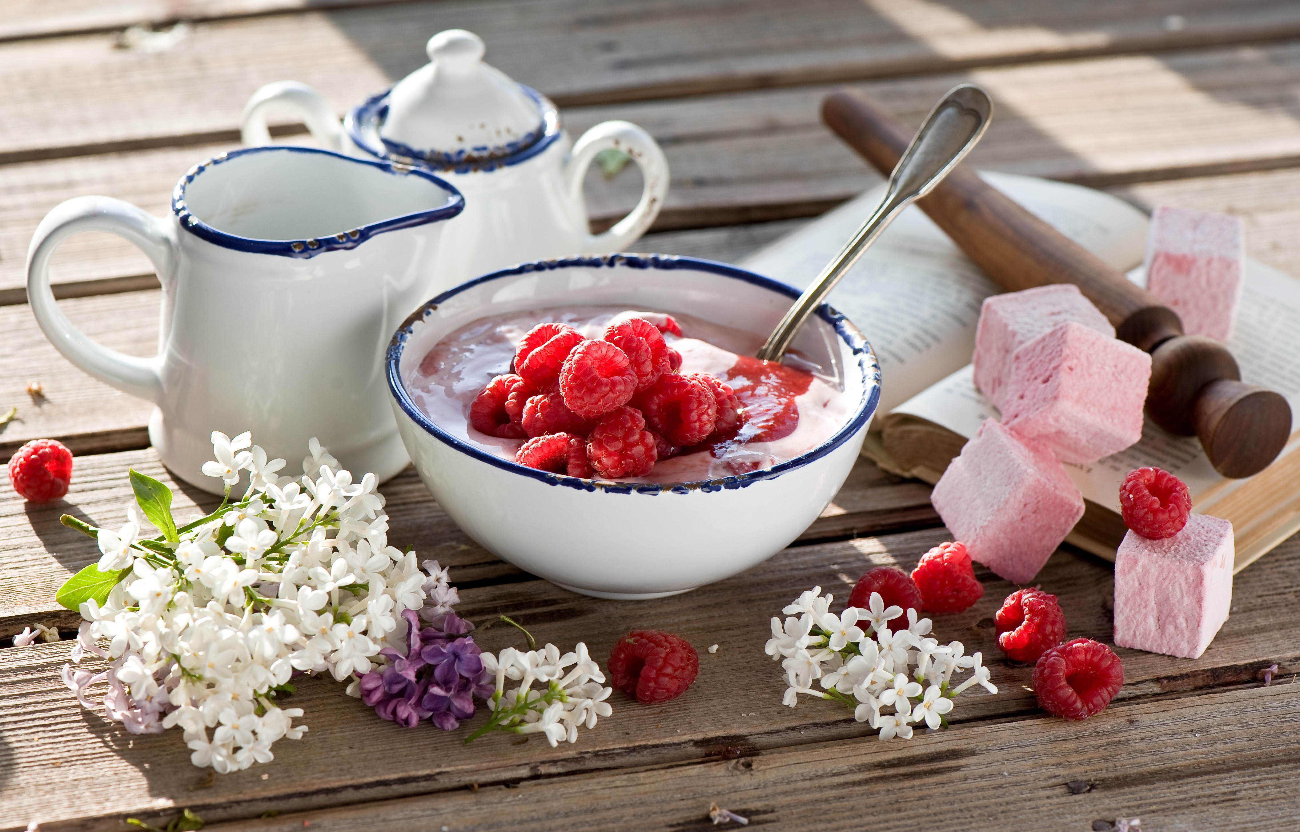 Raspberry yogurt with lilac and marshmallows on wood planks HD Wallpaper