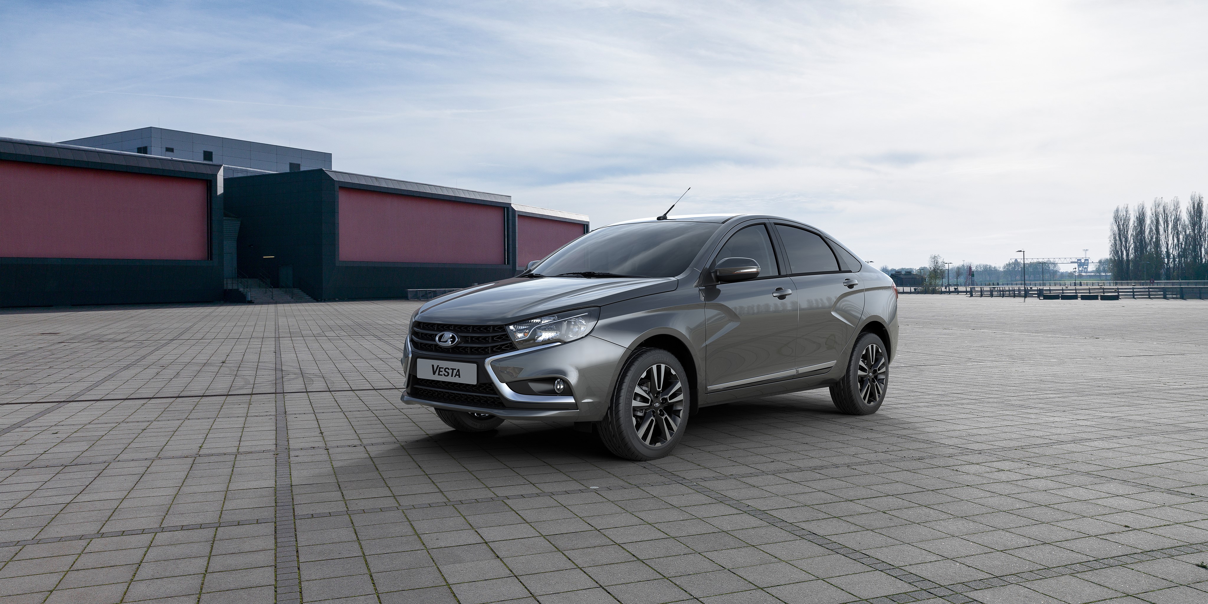 Grey Lada Vesta Sedan in an Outdoor Lot HD Wallpaper