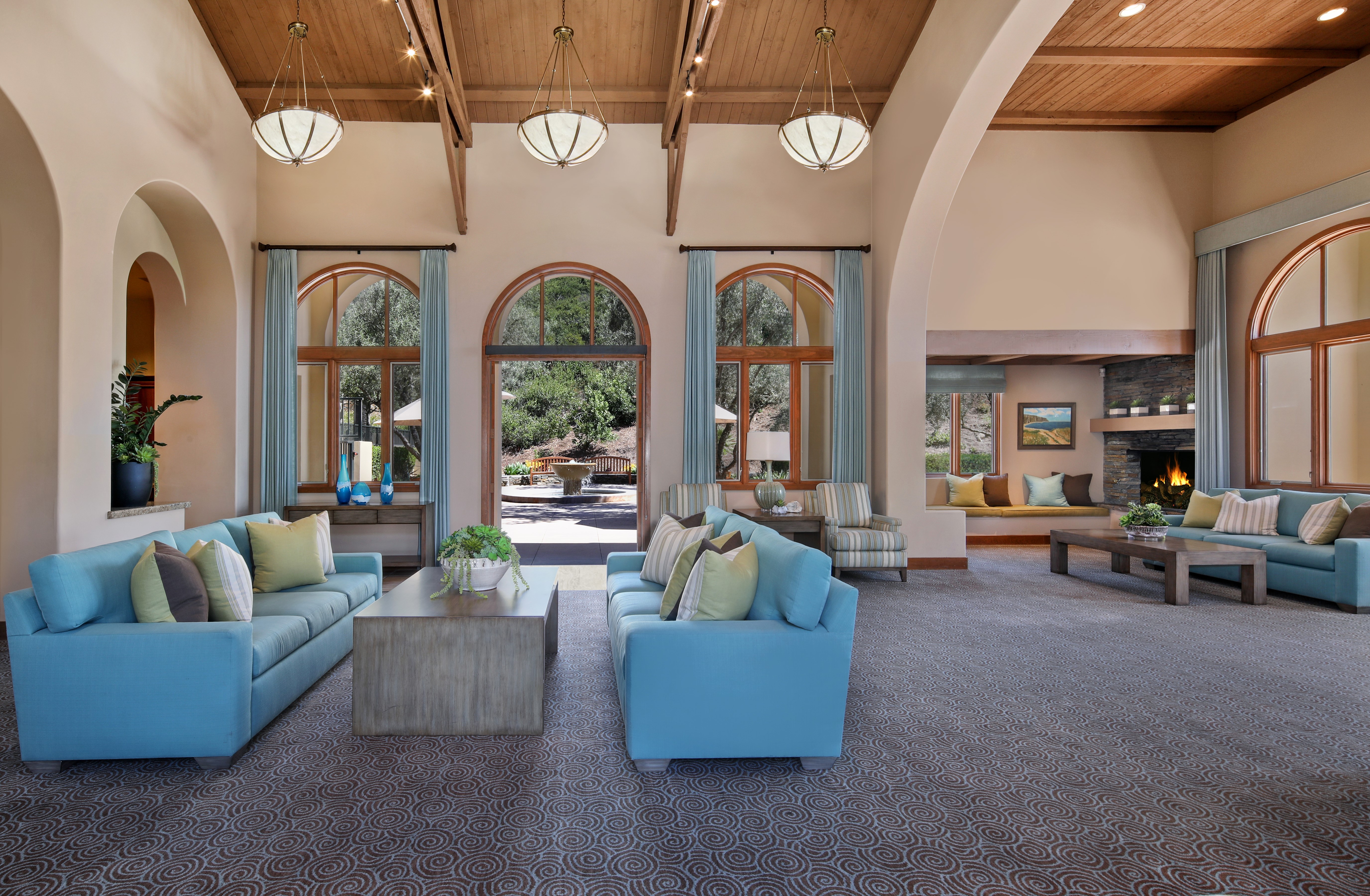 Interior design of a living room with sofas and chandeliers HD Wallpaper