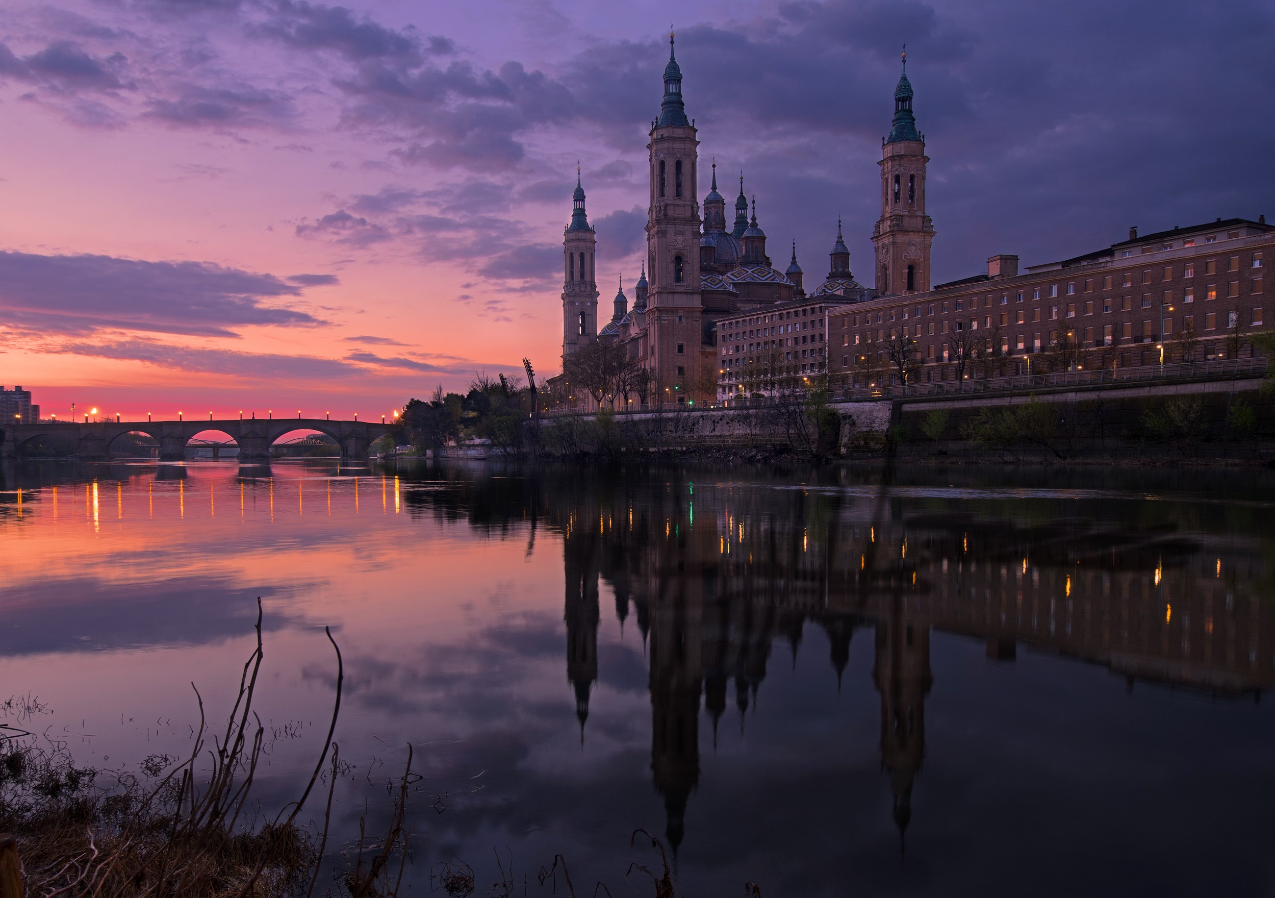 Basilica of Our Lady of the Pillar and Stone Bridge at Dusk HD Wallpaper