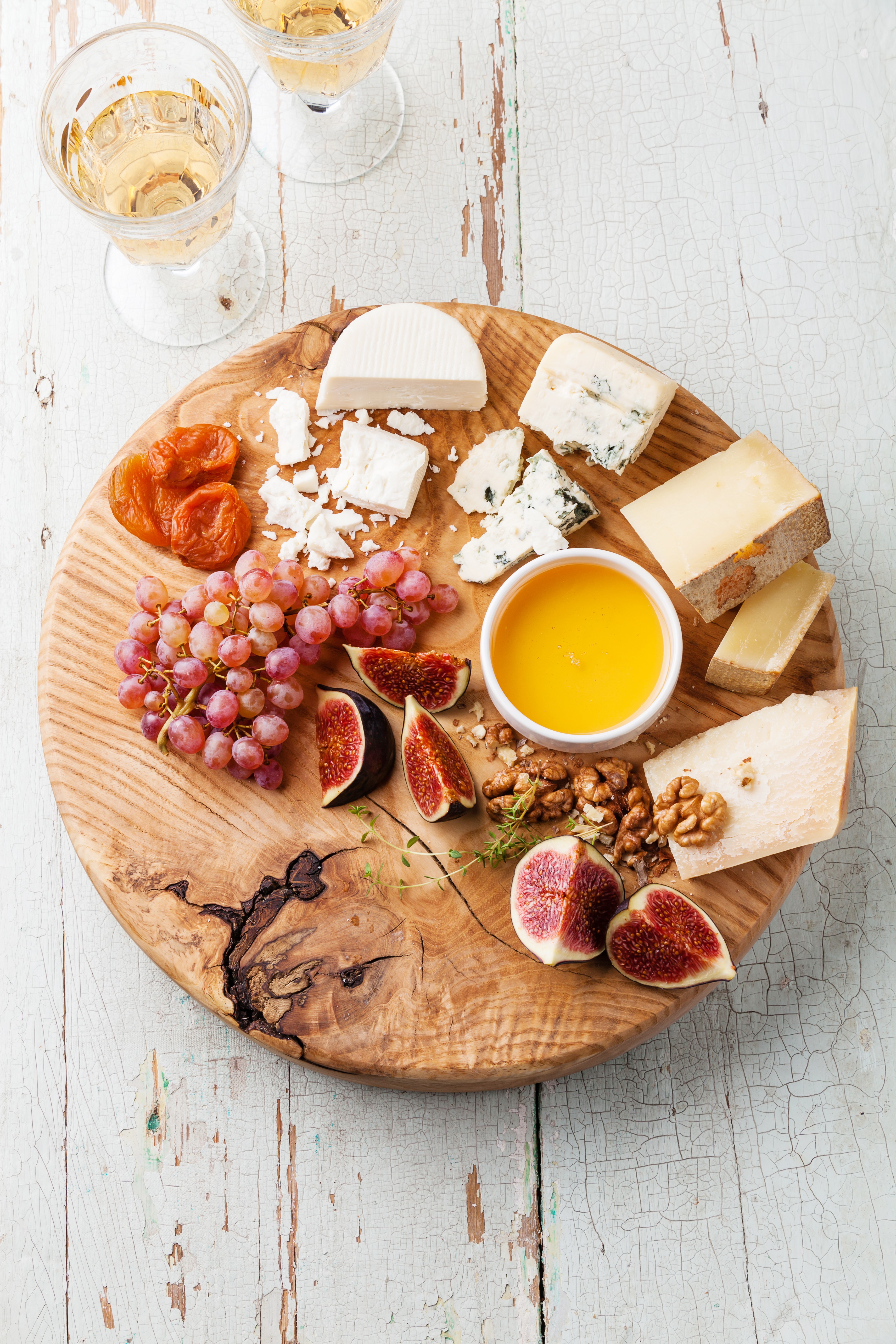 Cheese board with grapes, figs, honey, and nuts HD Phone Wallpaper