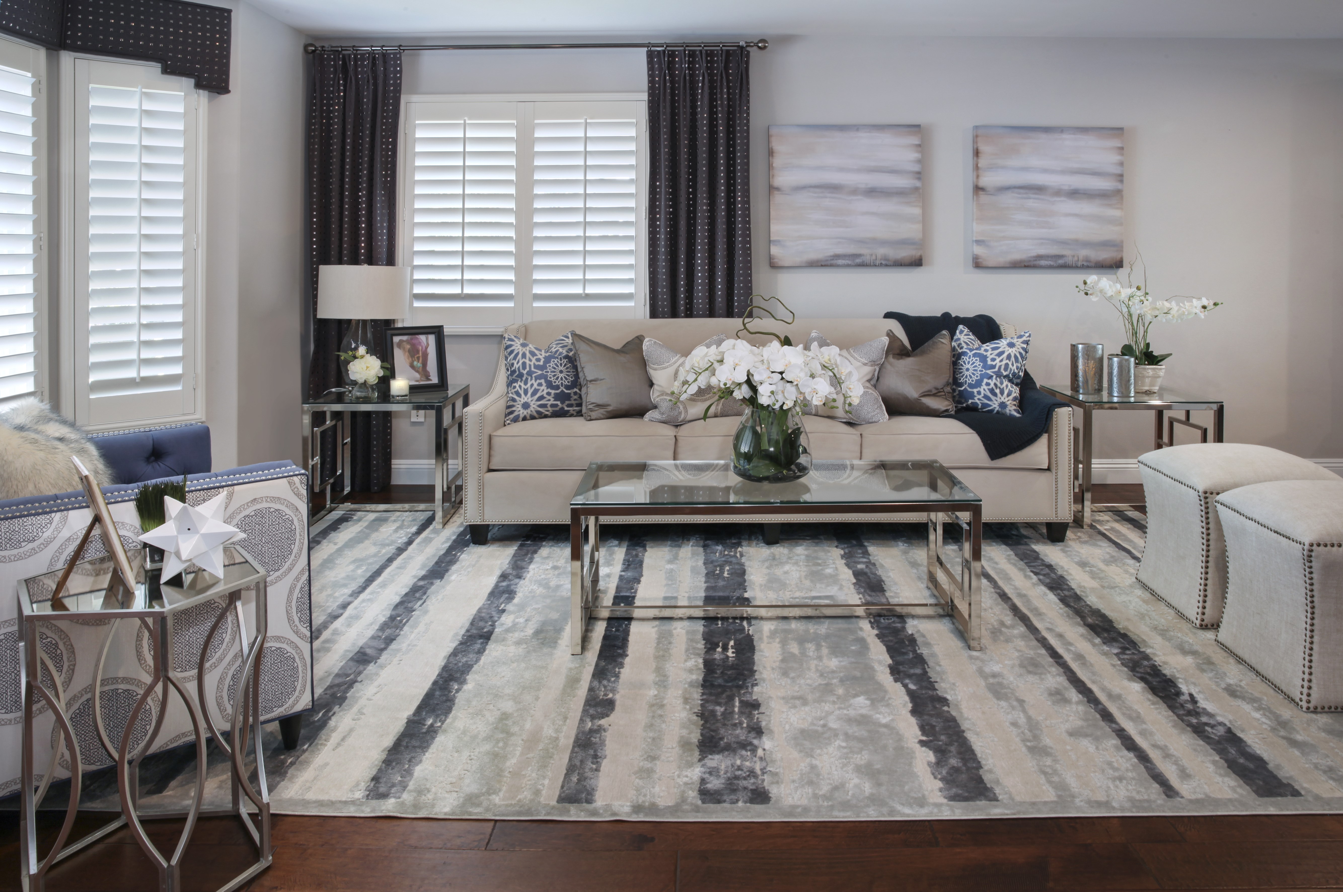 Living room with sofa, carpet, and pillows HD Wallpaper