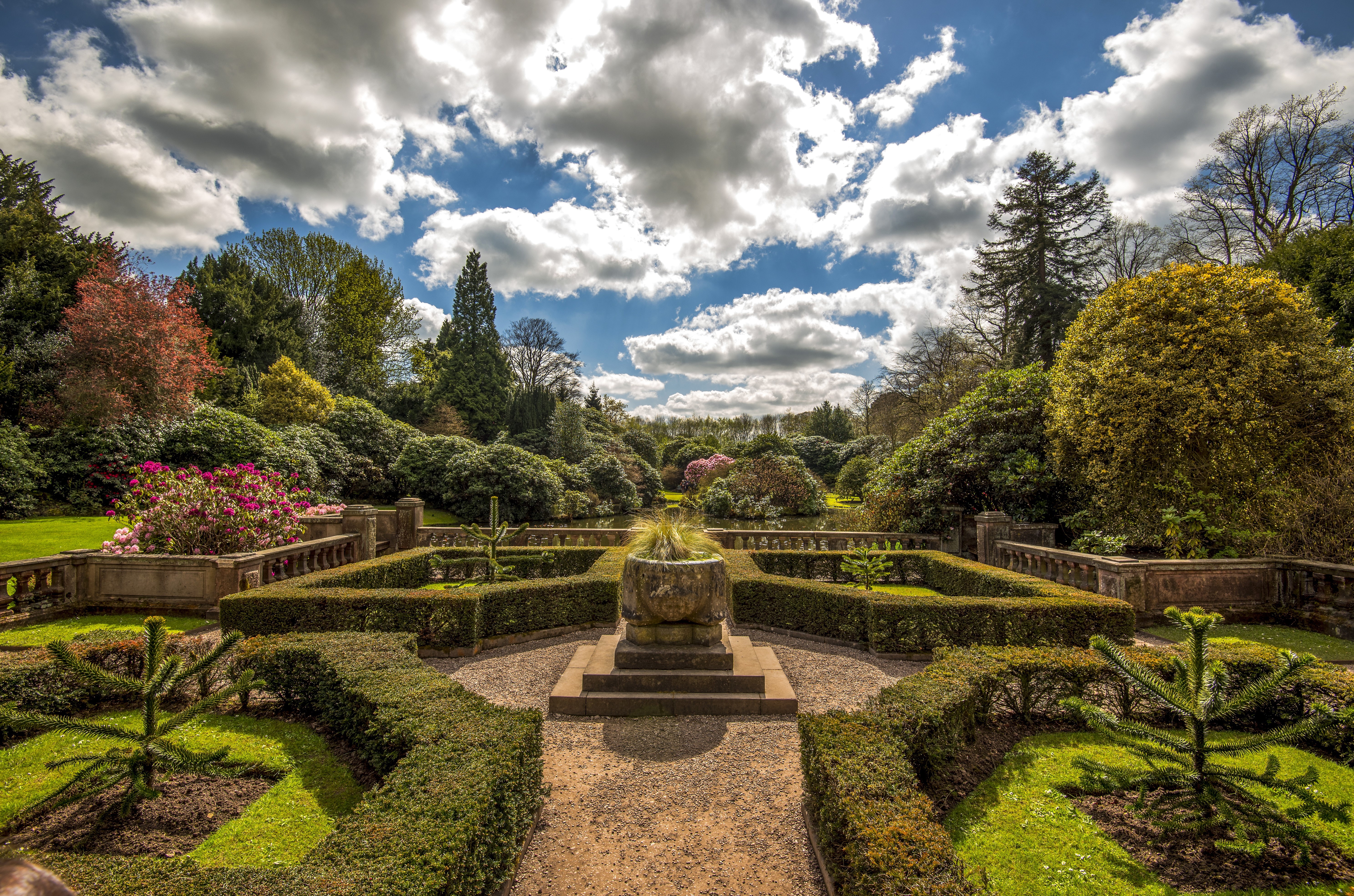 Formal Garden with Sculptural Elements and Pond HD Wallpaper