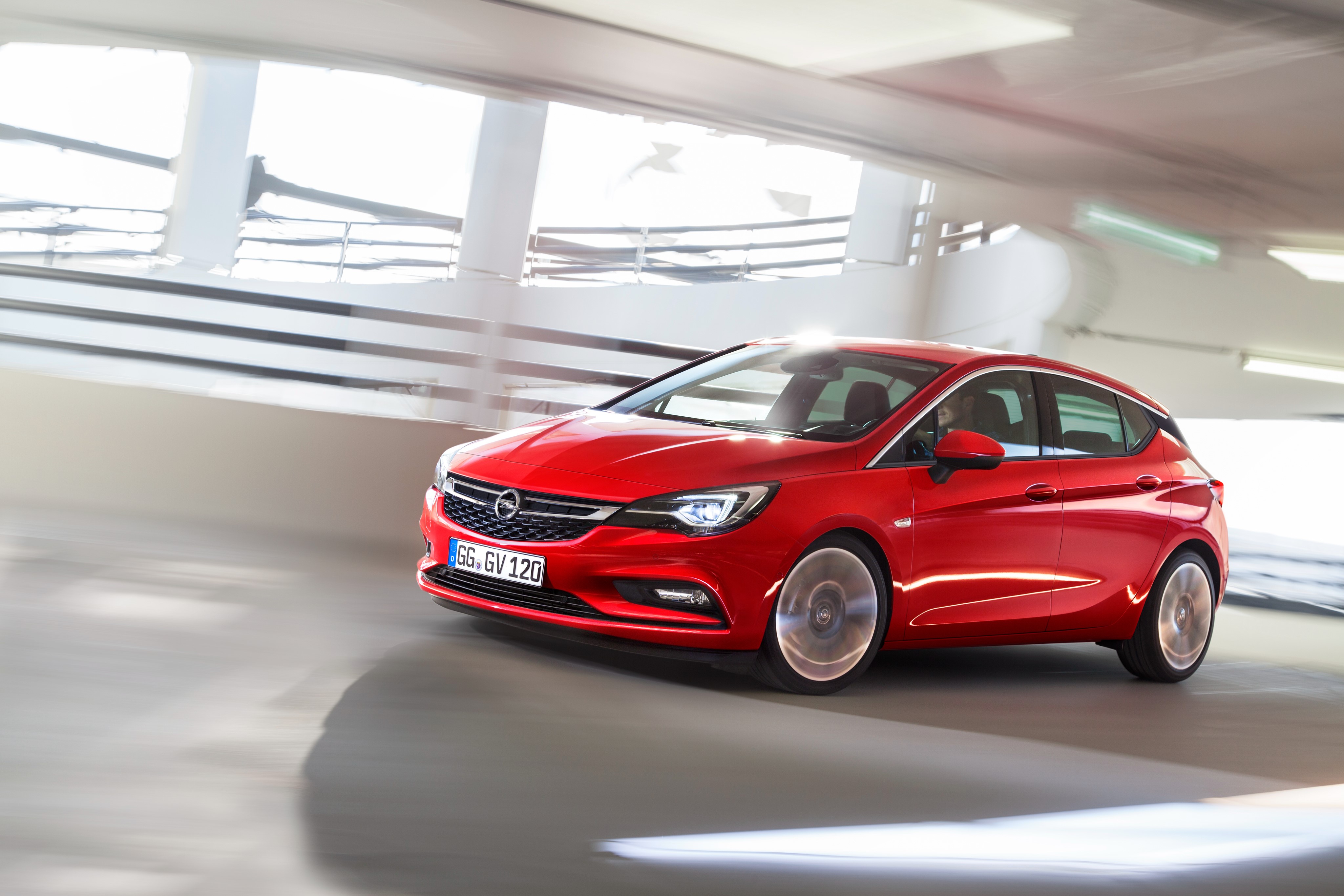 Red Opel Astra 2015 in motion HD Wallpaper
