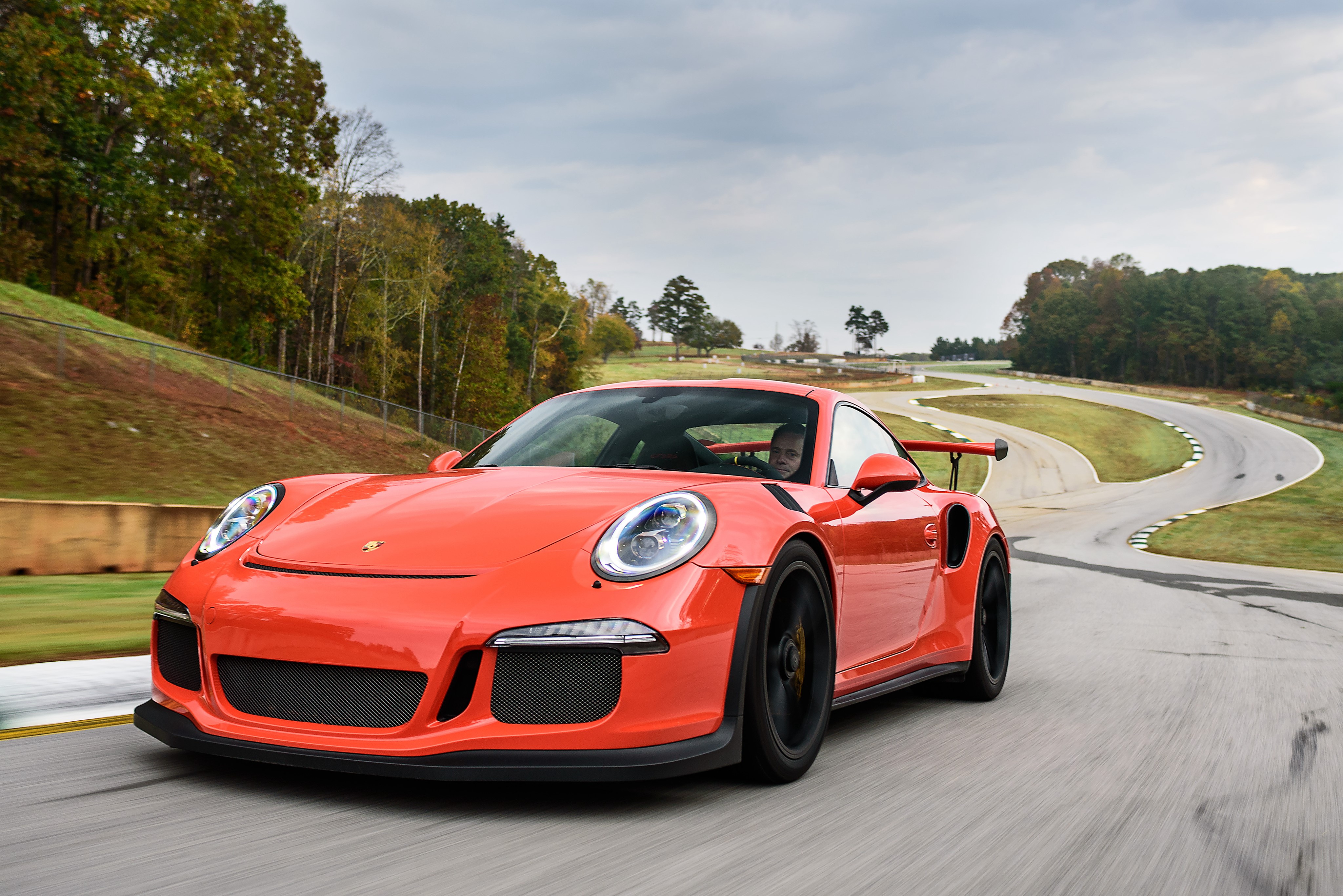 Orange Porsche 911 GT3 on a Race Track HD Wallpaper