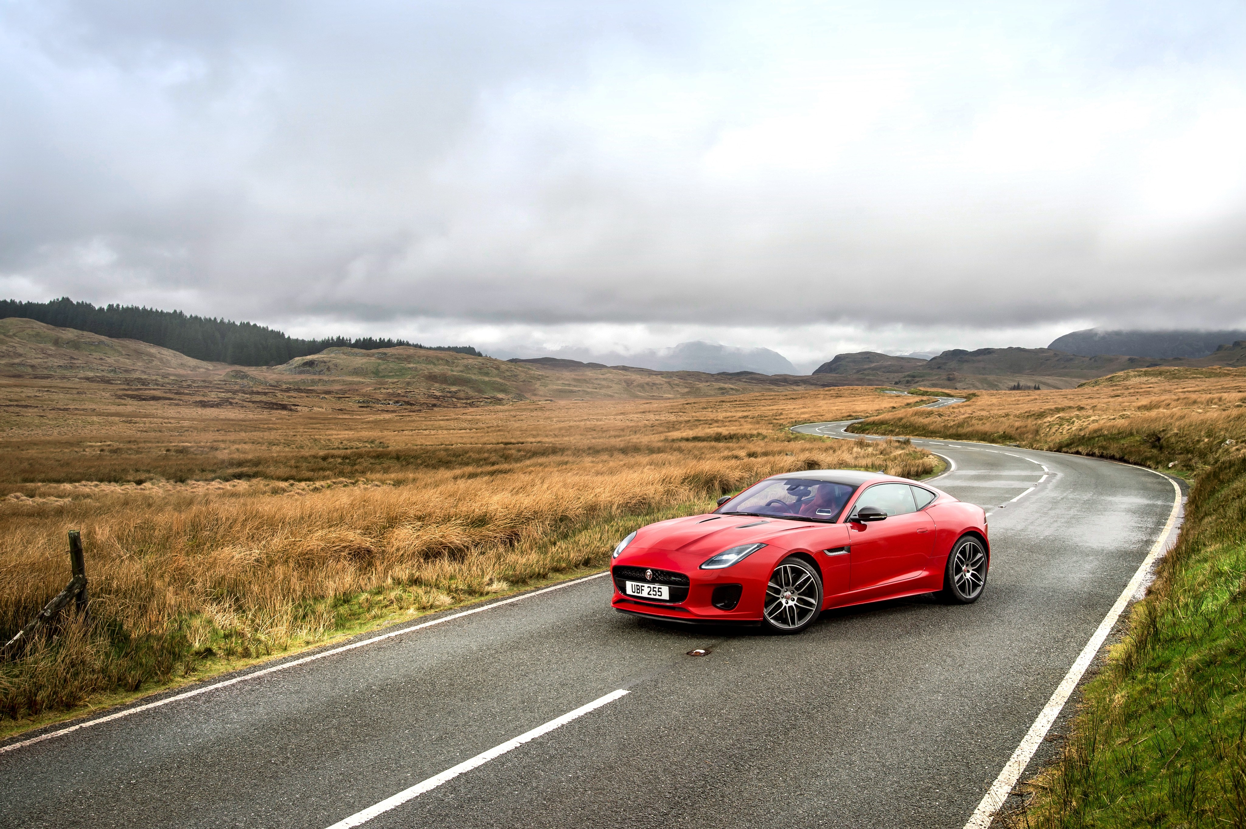 Red 2017 Jaguar F-Type R-Dynamic Coupe on a road HD Wallpaper