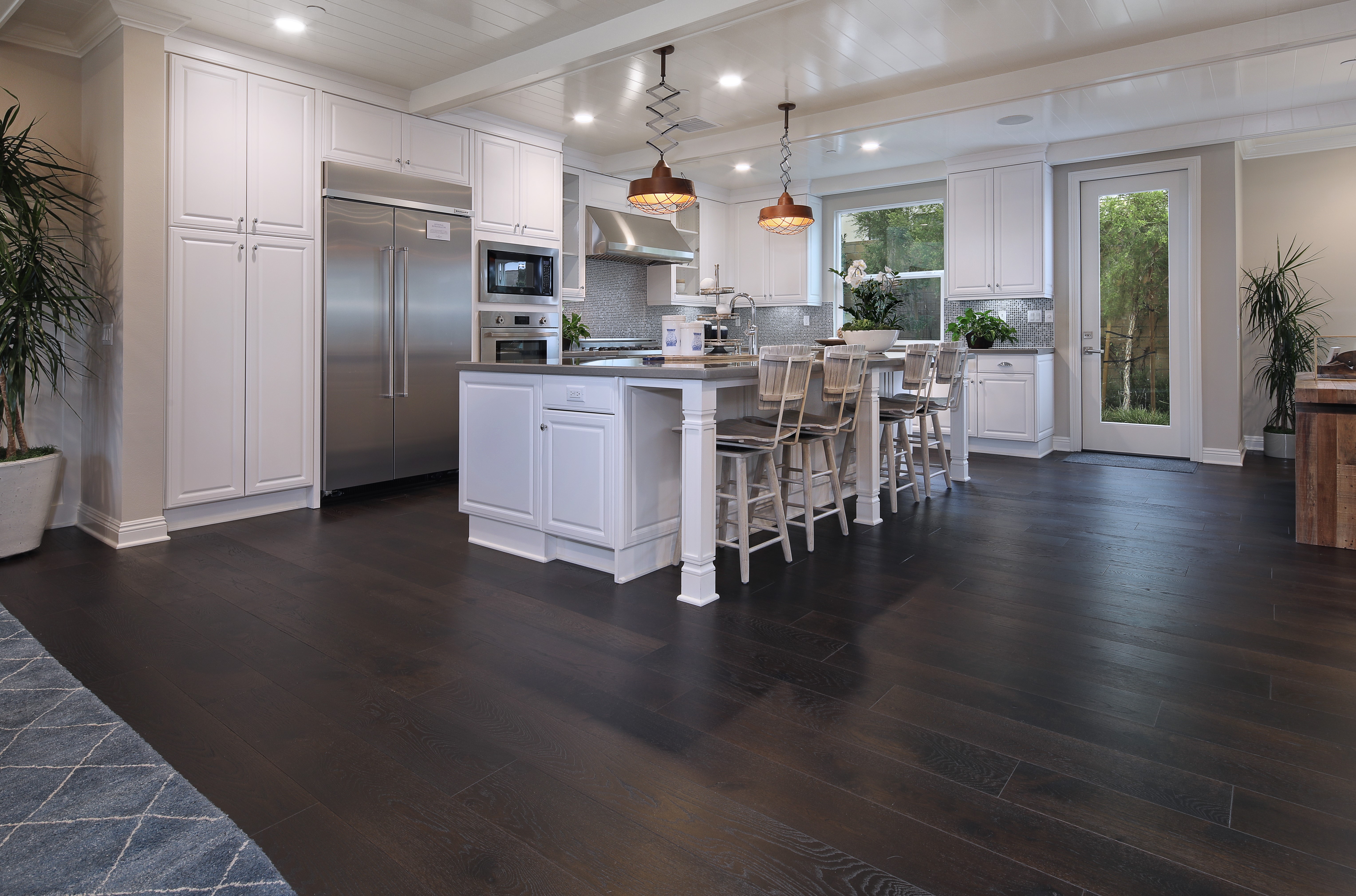 Modern Kitchen with Island and Stainless Steel Appliances HD Wallpaper