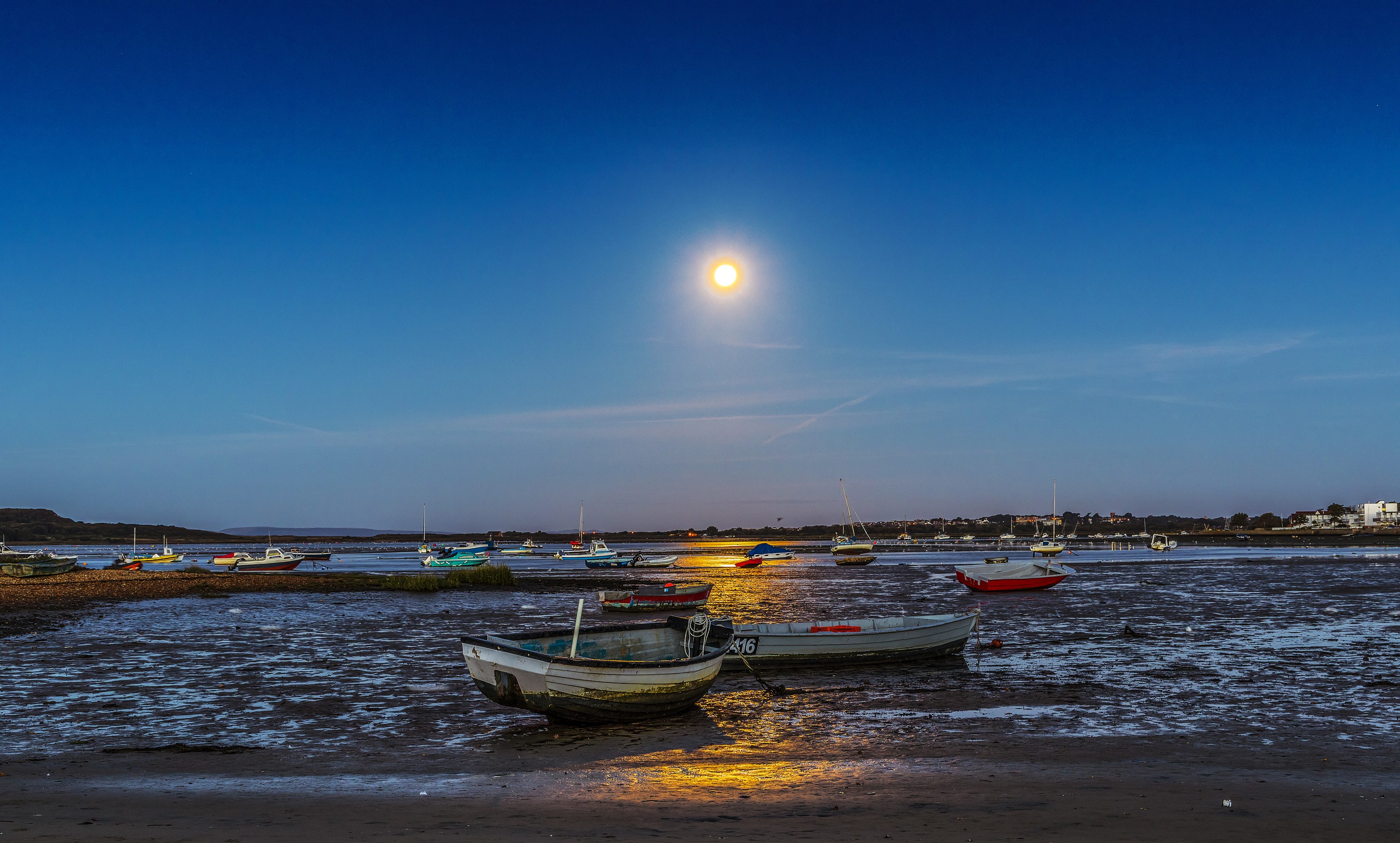 Moonlit Evening with Boats on Mudflats in Dorset, England HD Wallpaper