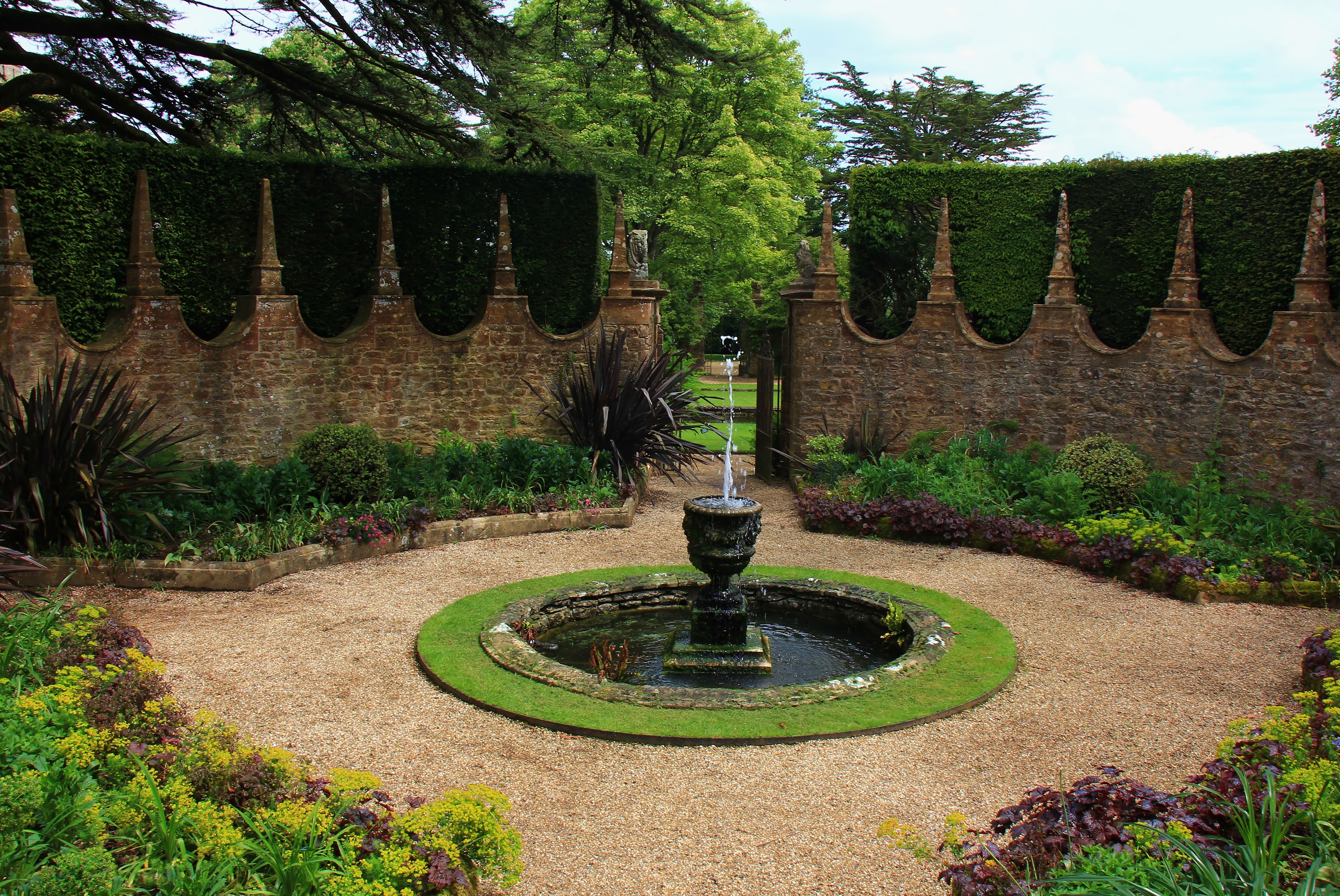 Fountain in Athelhampton House Gardens, Dorset, United Kingdom HD Wallpaper