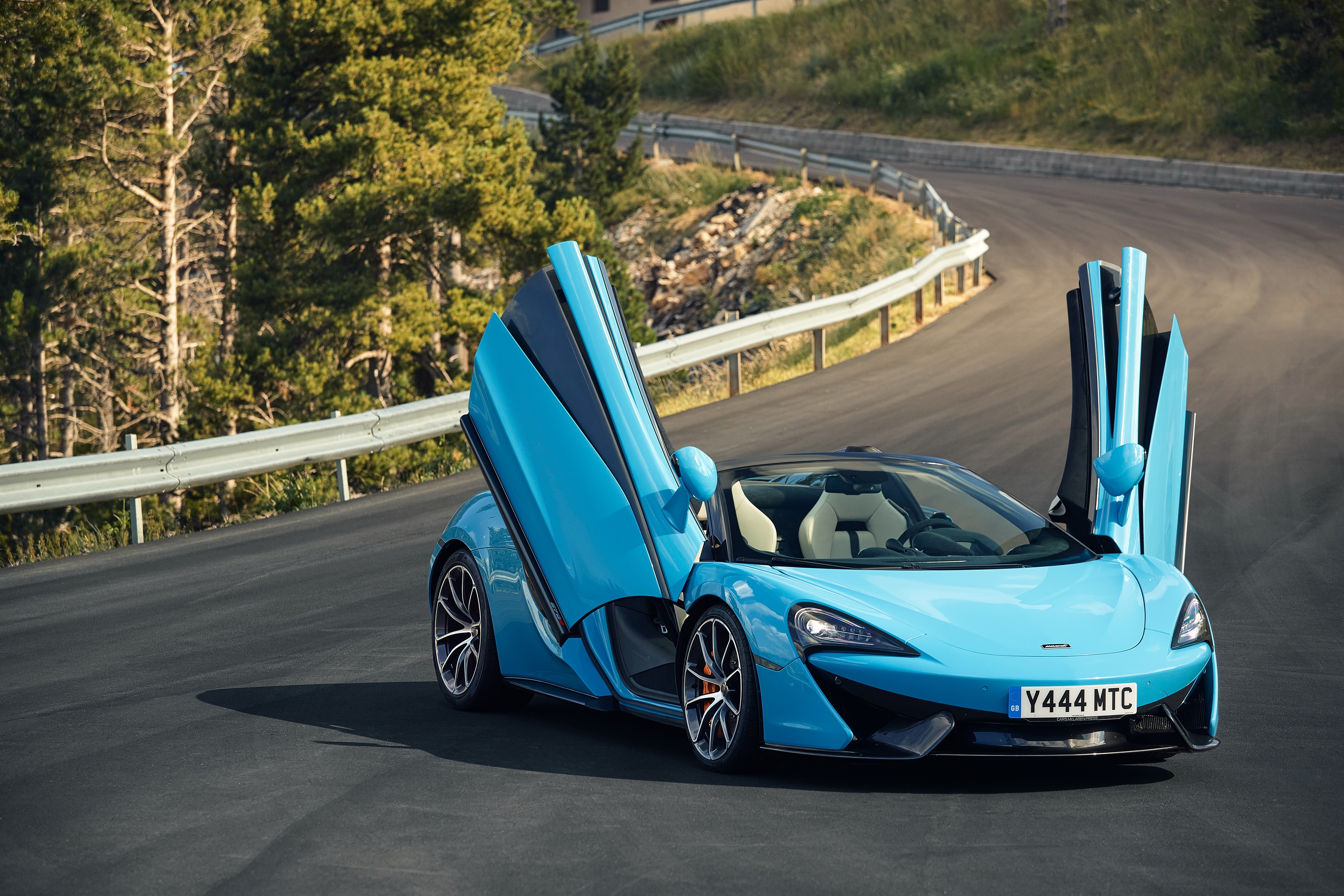 Light Blue McLaren 570S Spider with Opened Doors HD Wallpaper