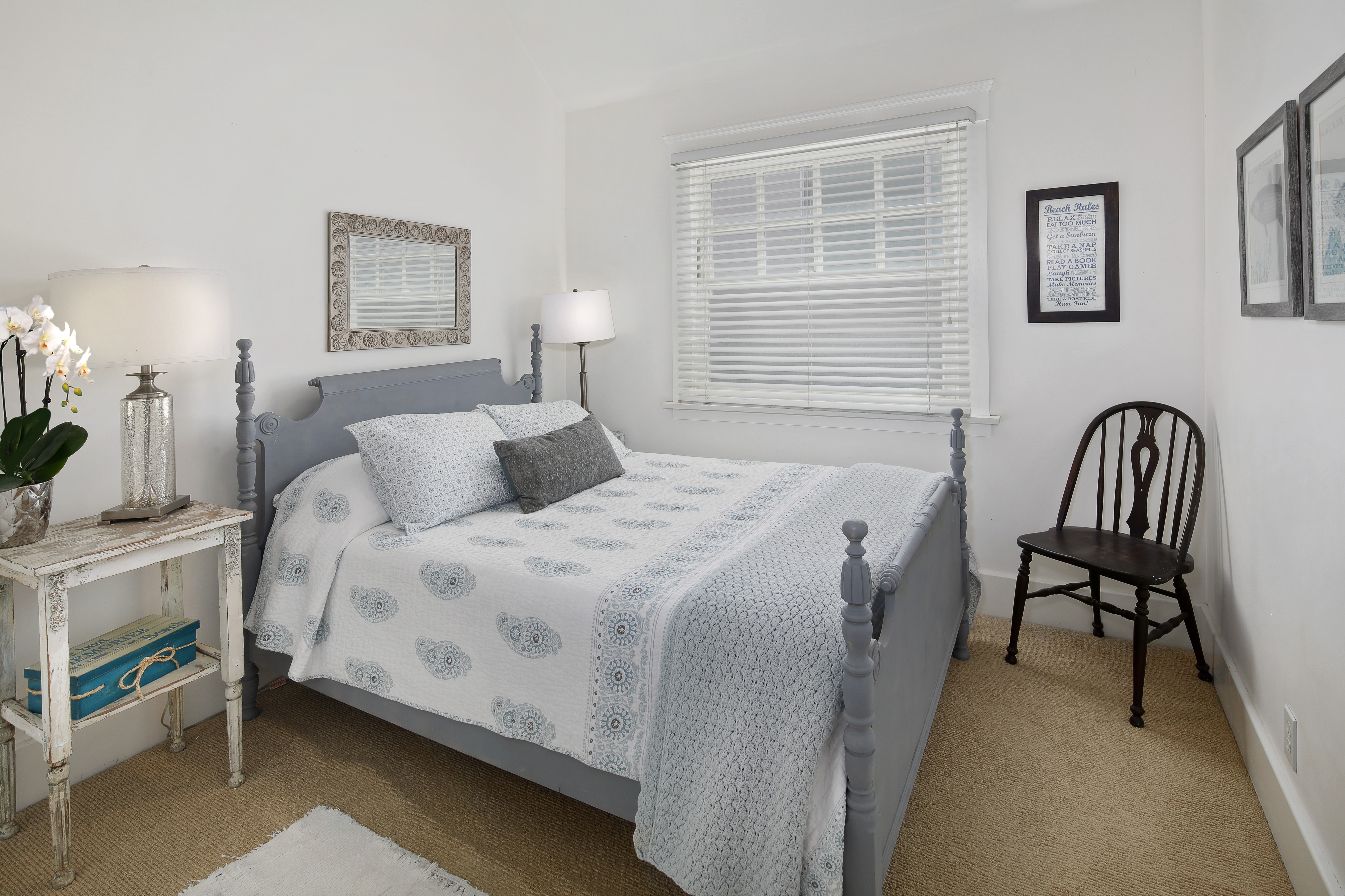 Bedroom with bed, lamps, and chair HD Wallpaper