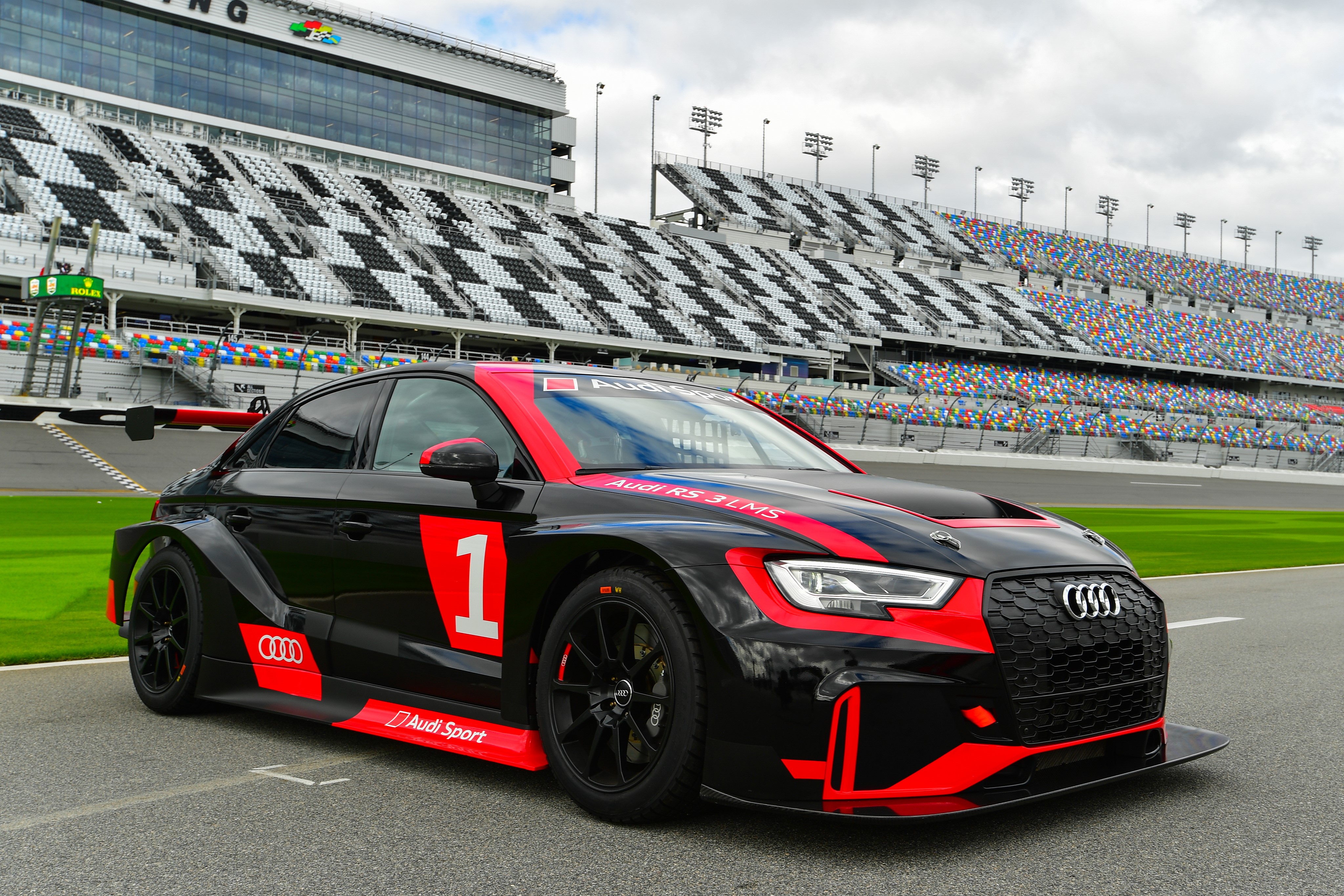 Audi RS 3 LMS race car with Daytona Grandstands HD Wallpaper