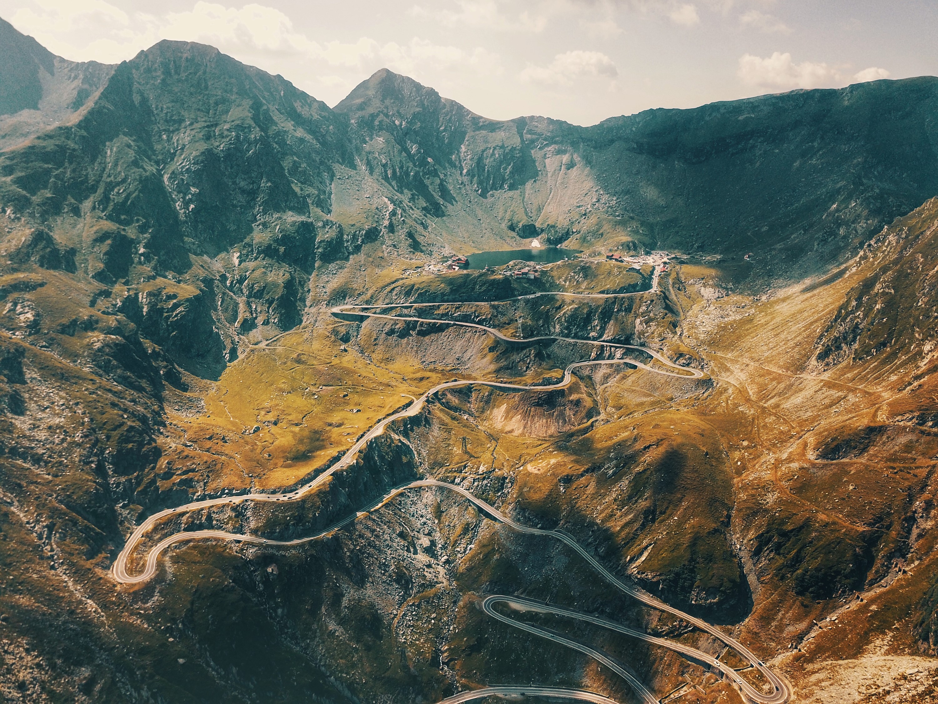 Winding mountain road in Sibiu, Romania HD Wallpaper