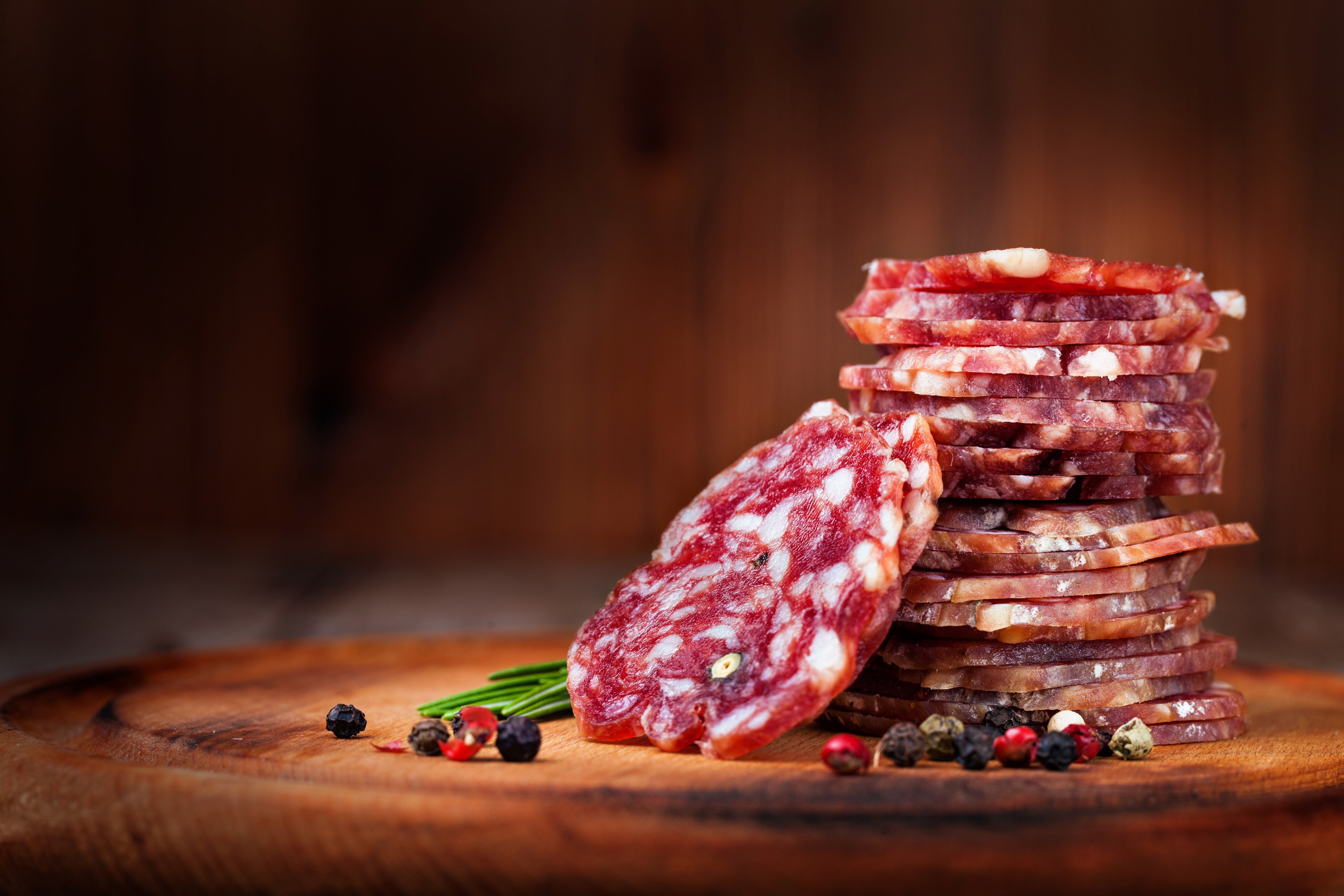 Stack of Salami Slices with Spices HD Wallpaper