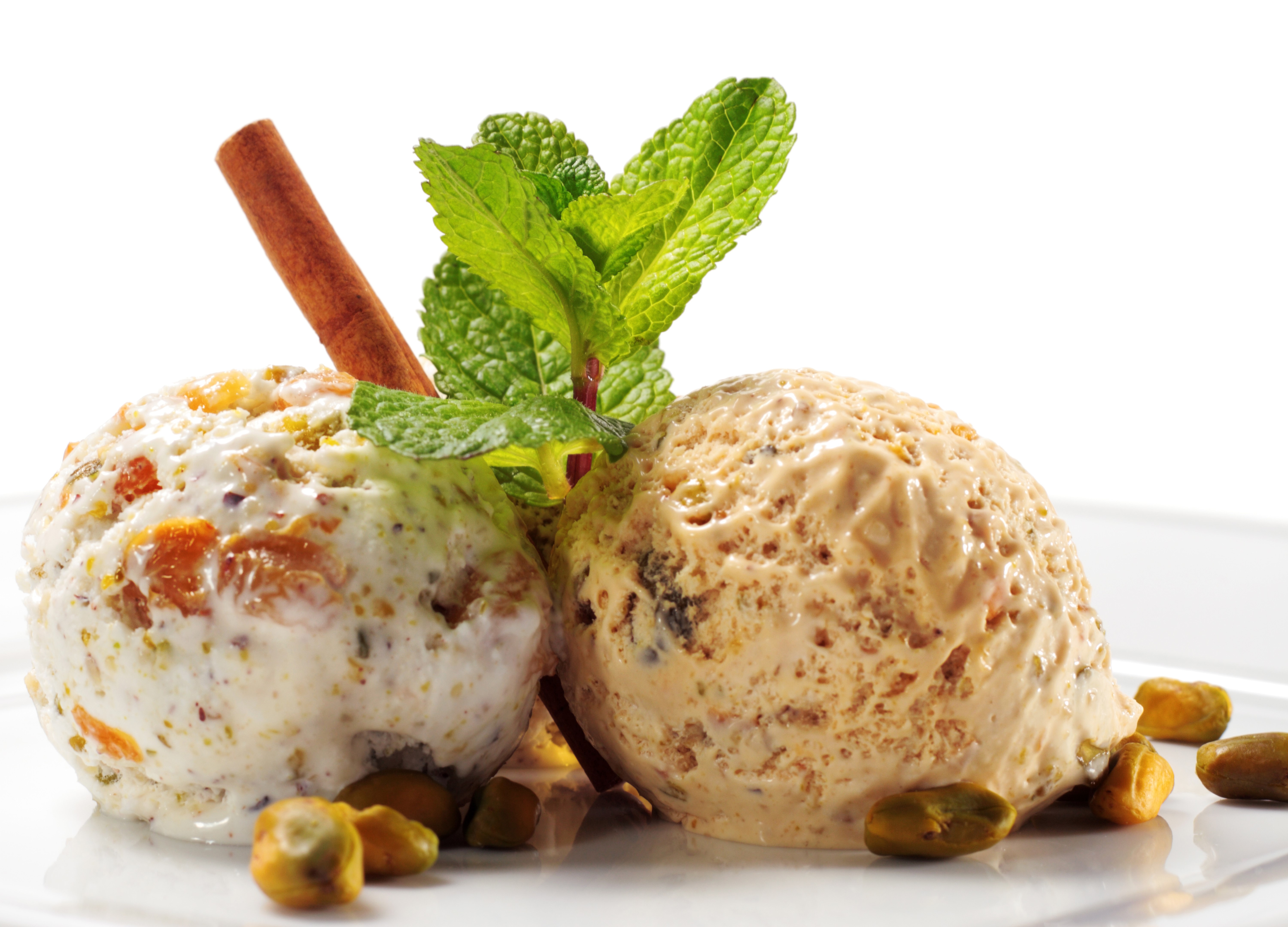 Two scoops of ice cream with pistachios and mint HD Wallpaper