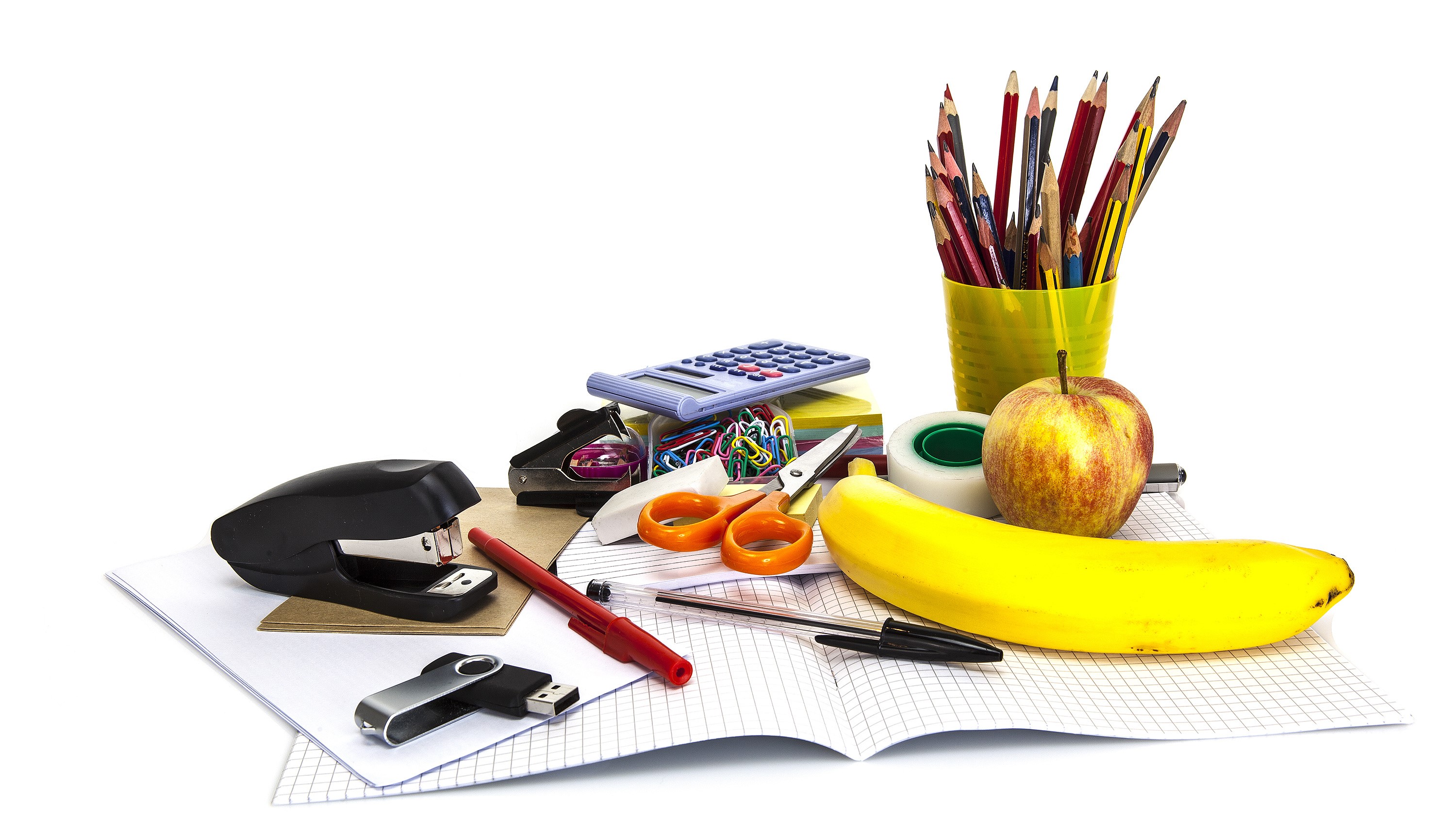 School supplies and fruit on a white background HD Wallpaper