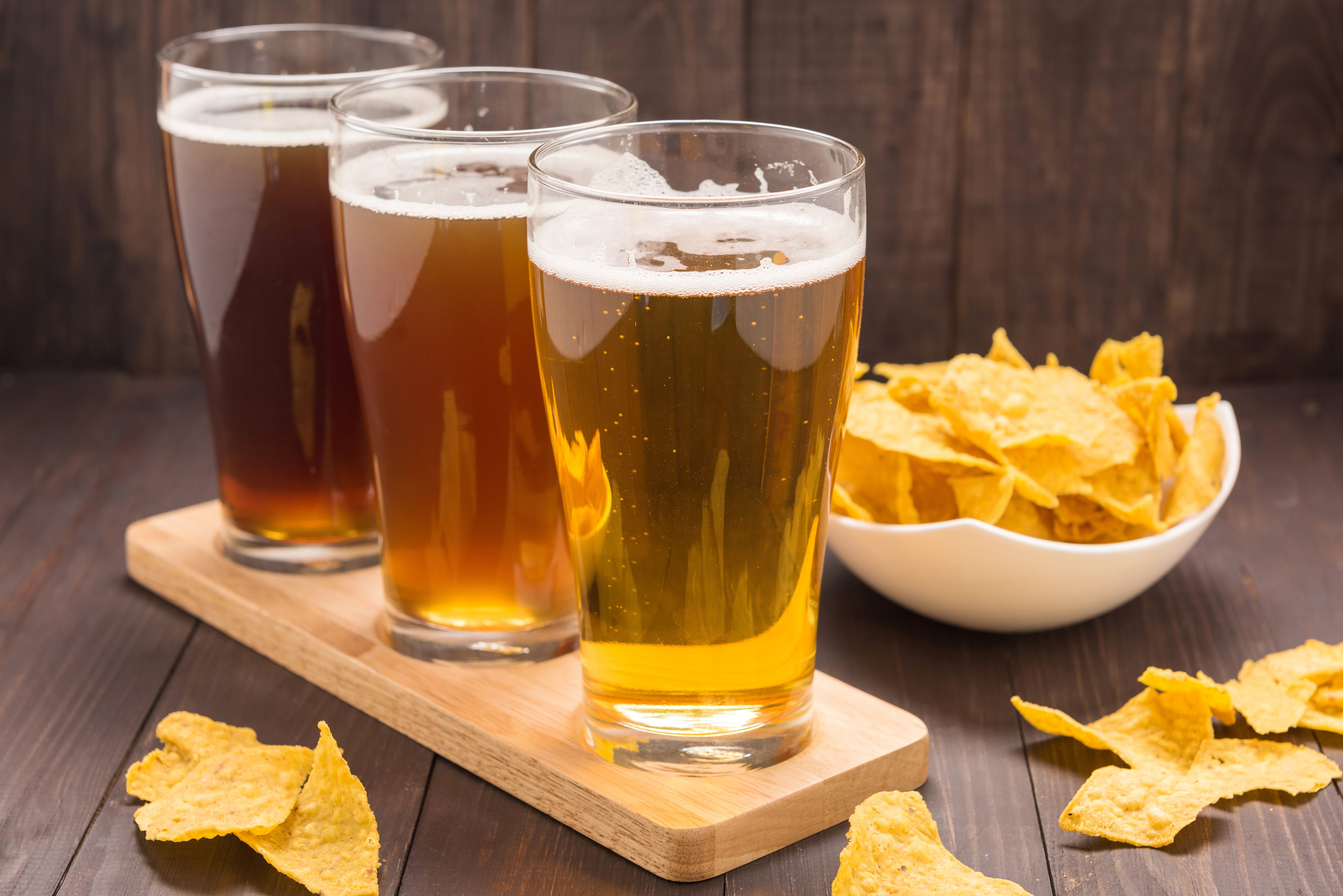 Three glasses of beer with chips HD Wallpaper
