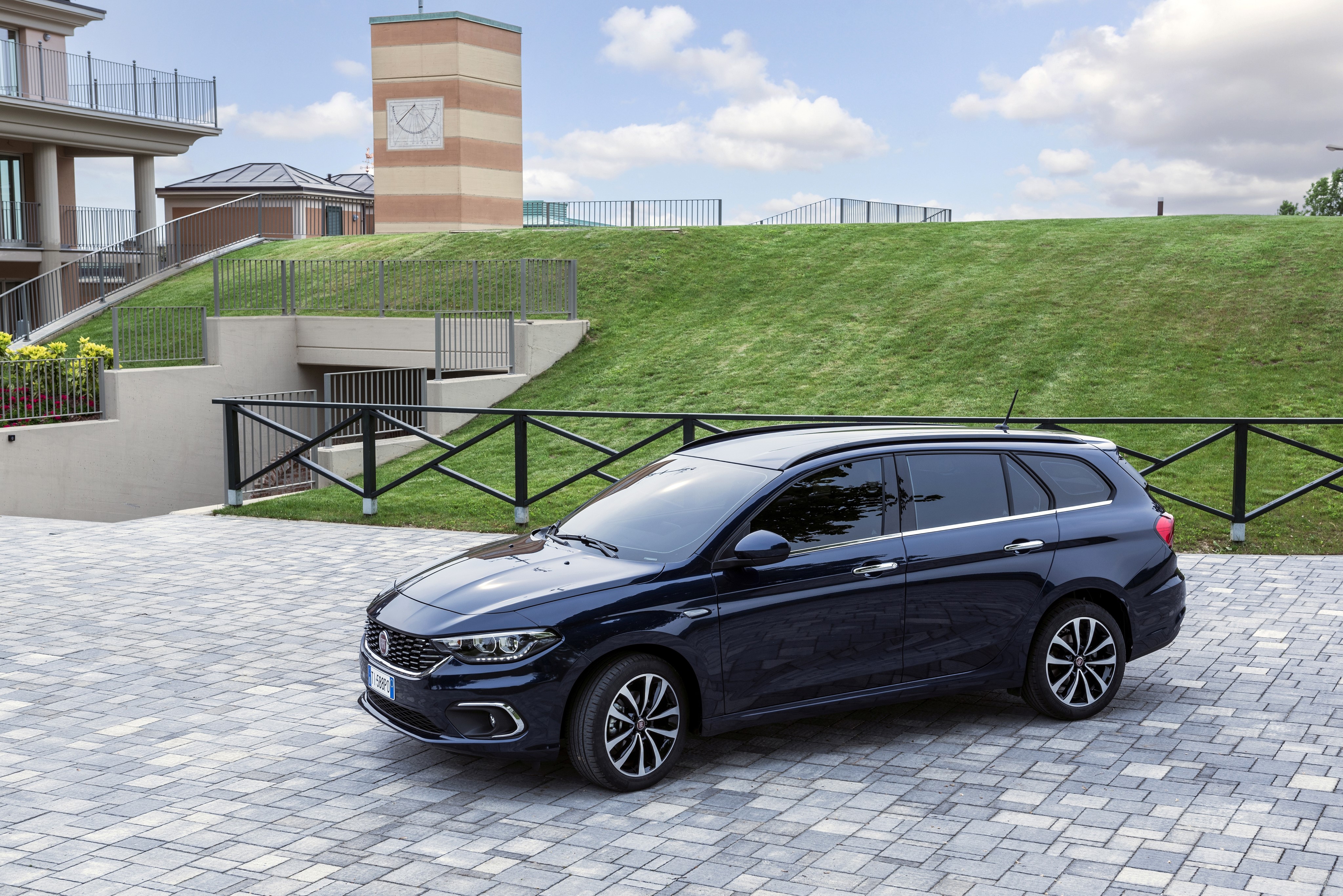 Blue Fiat Tipo Station Wagon parked on paved area HD Wallpaper