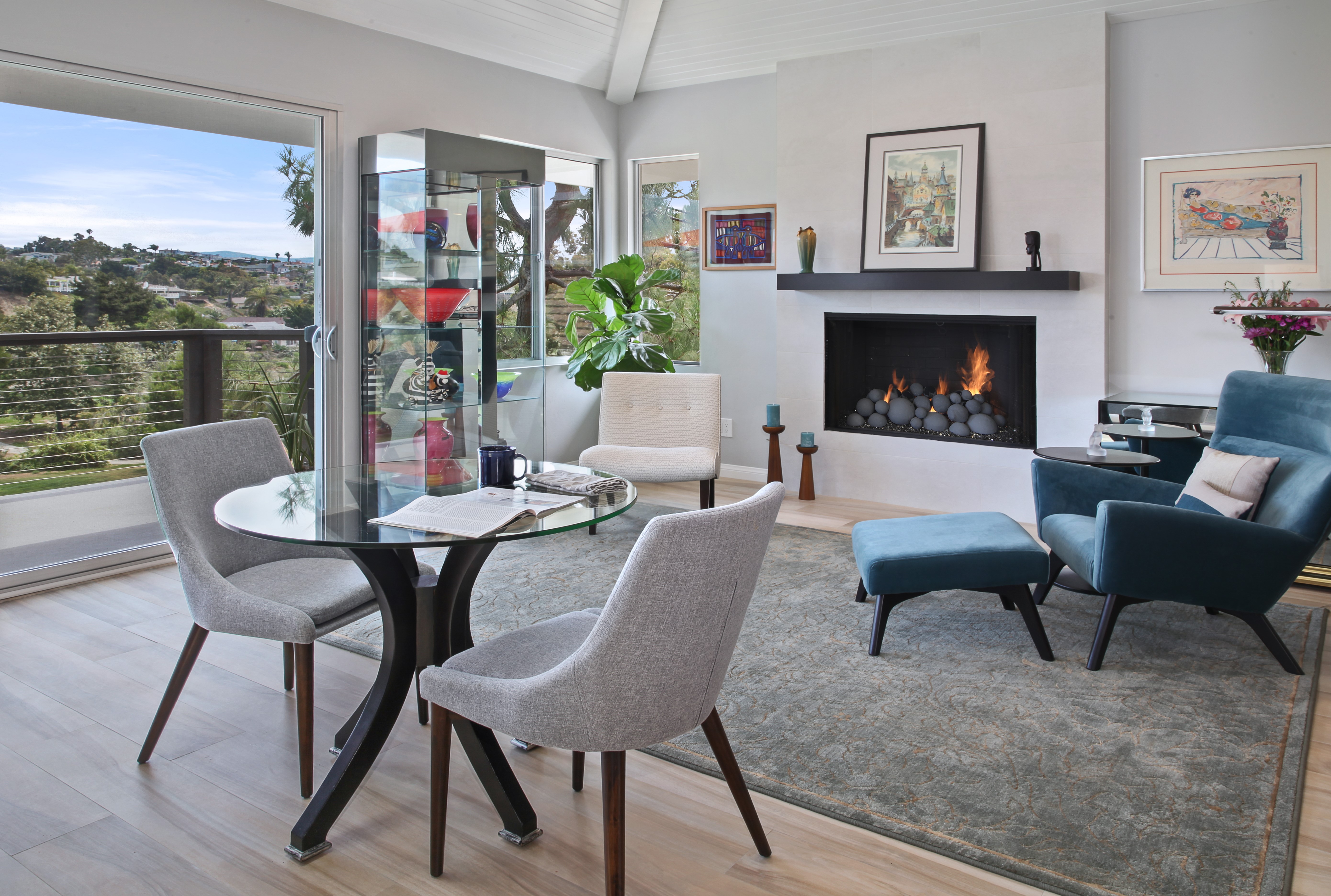 Living room with fireplace and dining table HD Wallpaper
