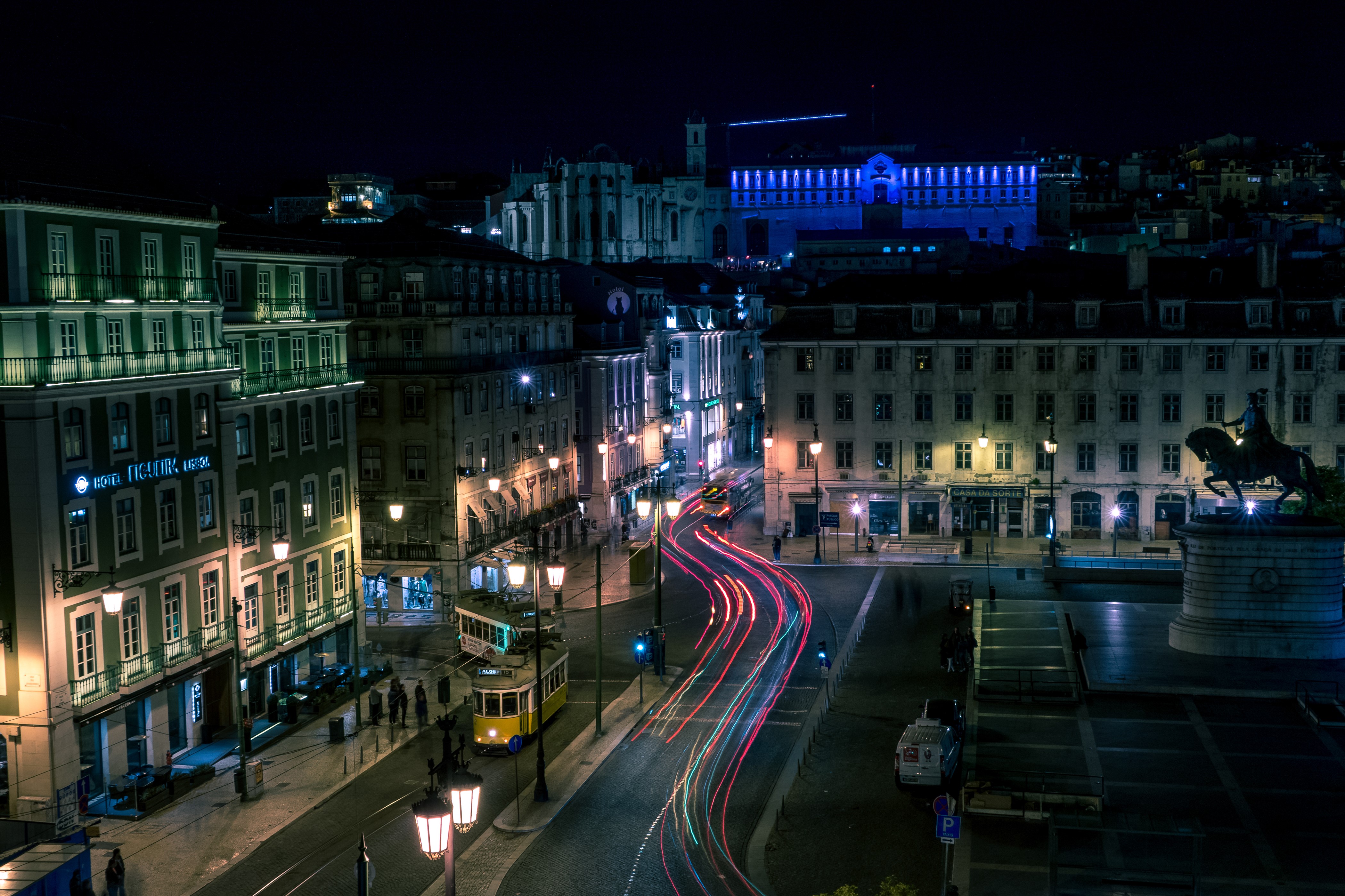 Lisbon Street at Night with Tram and Light Trails HD Wallpaper