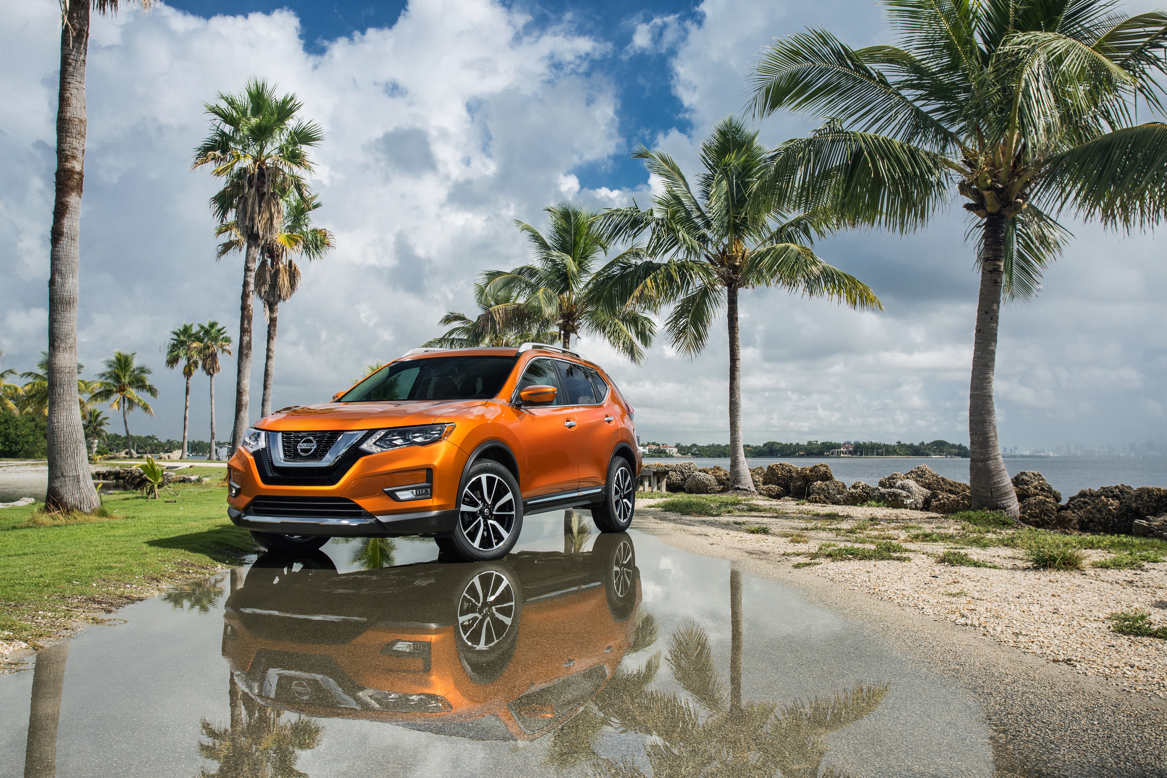 4K Orange 2017 Nissan Rogue with Palms HD Wallpaper