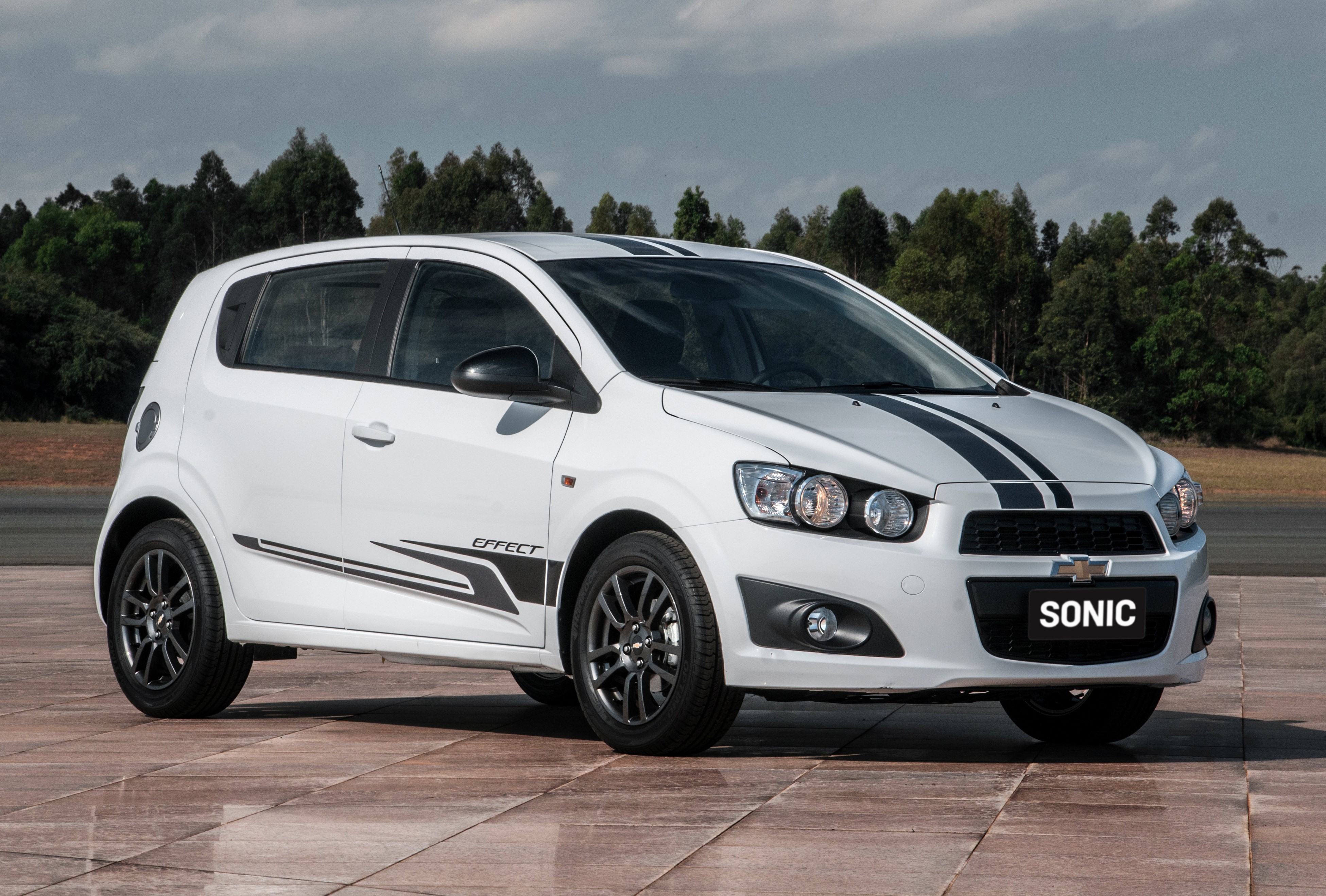White Chevrolet Sonic Effect with racing stripes HD Wallpaper