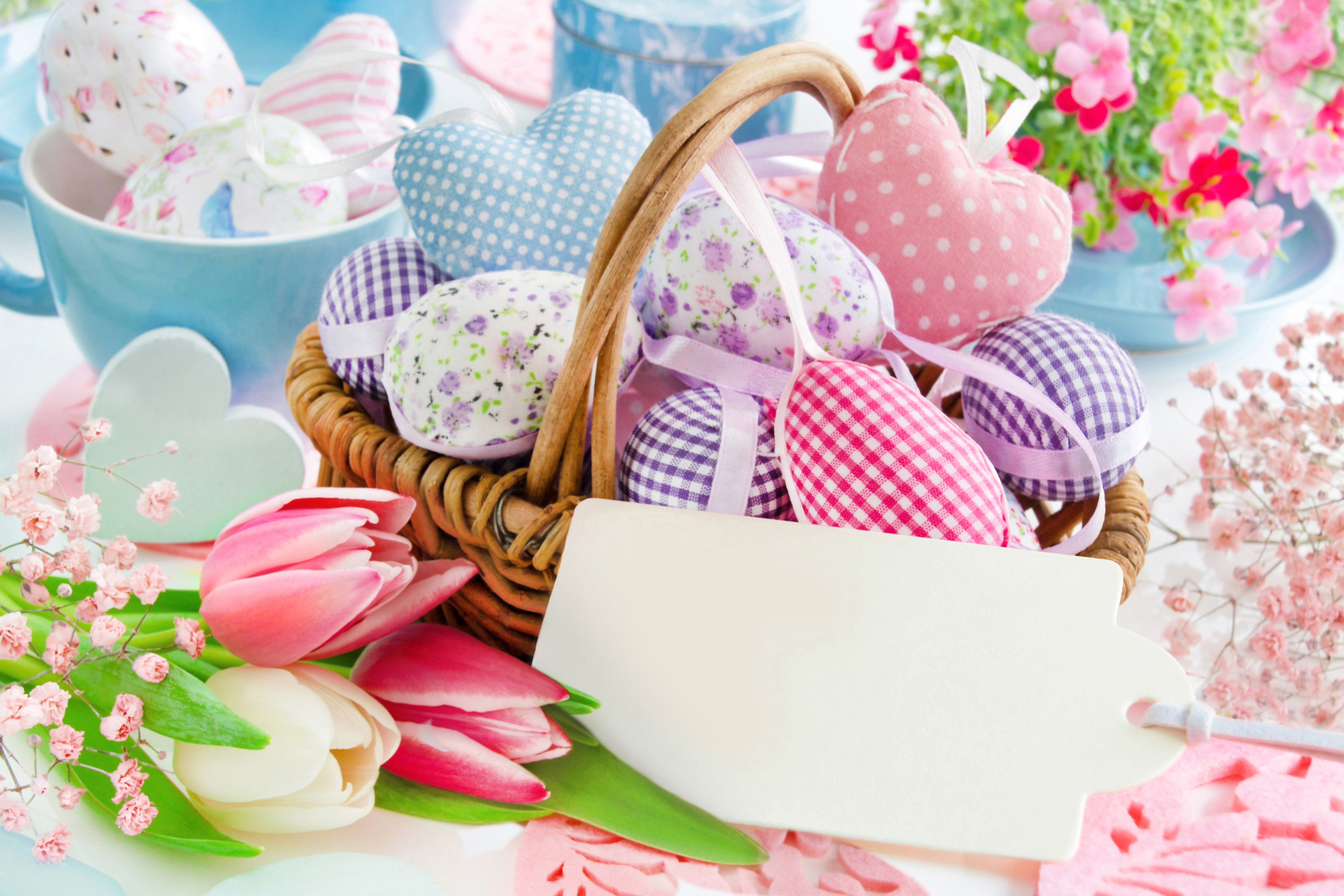 Easter eggs and tulips in a wicker basket HD Wallpaper