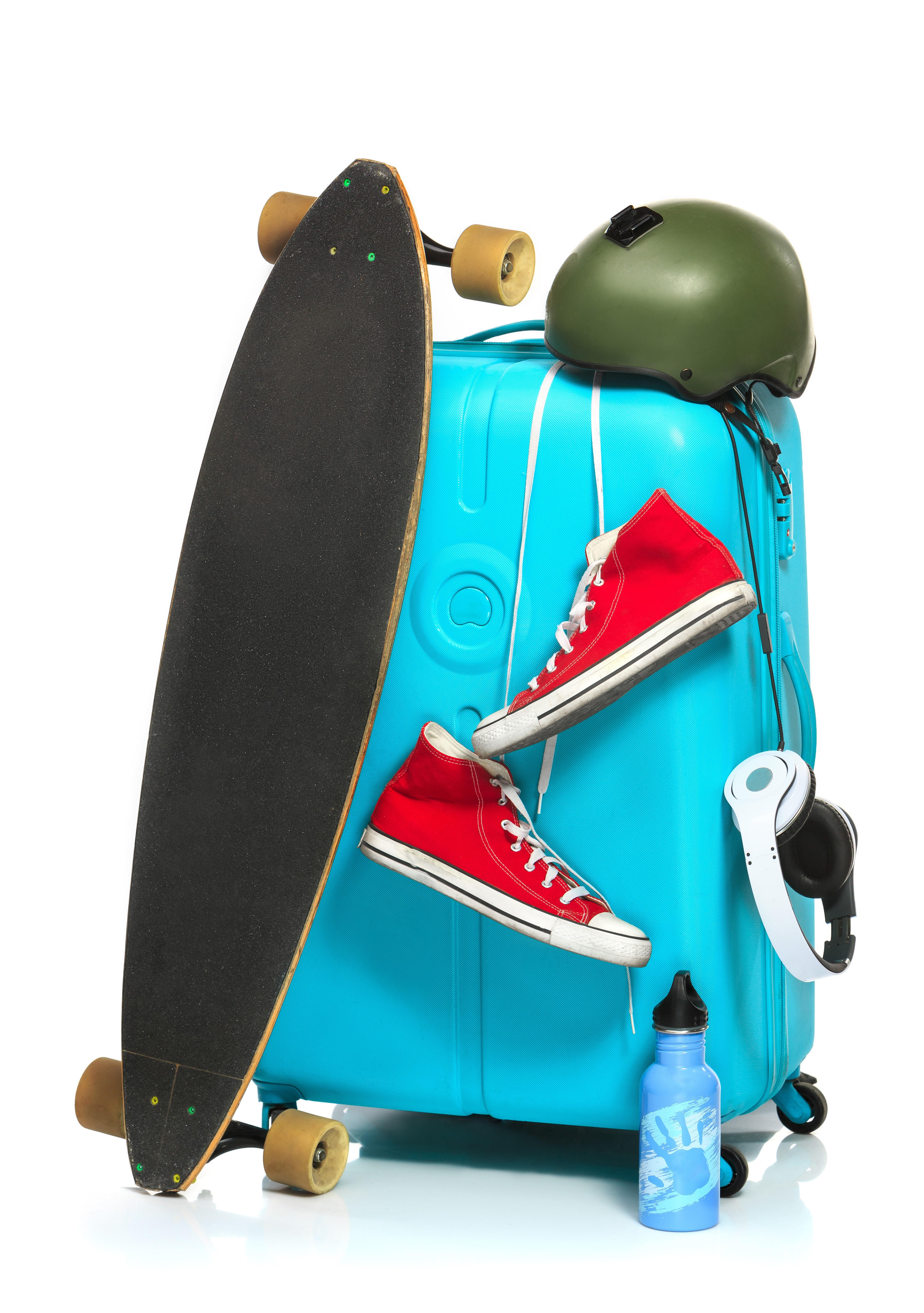 Turquoise suitcase with skateboard, red shoes, helmet, headphones, and water bottle HD Phone Wallpaper