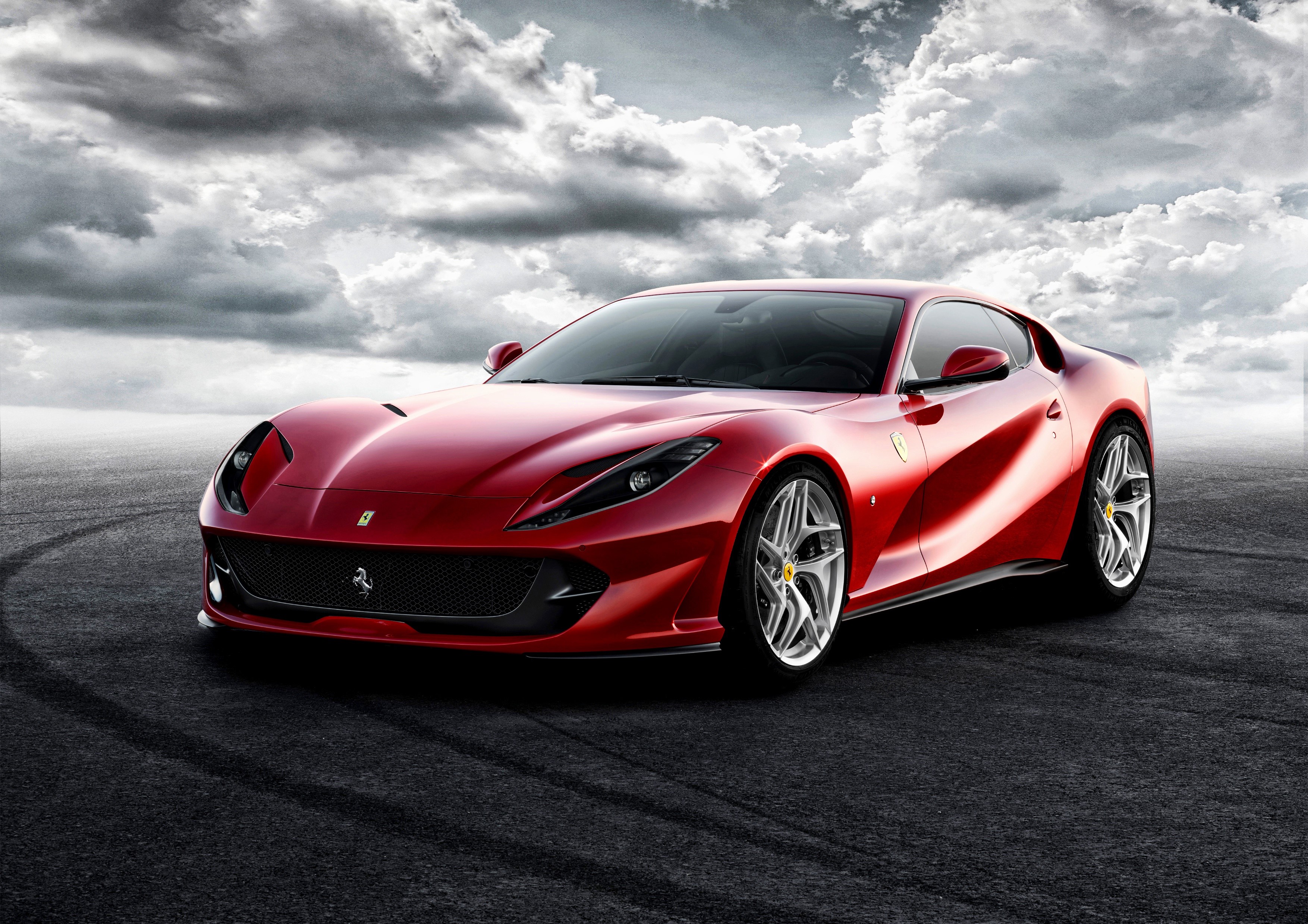 Red Ferrari 812 Superfast on a dark road HD Wallpaper