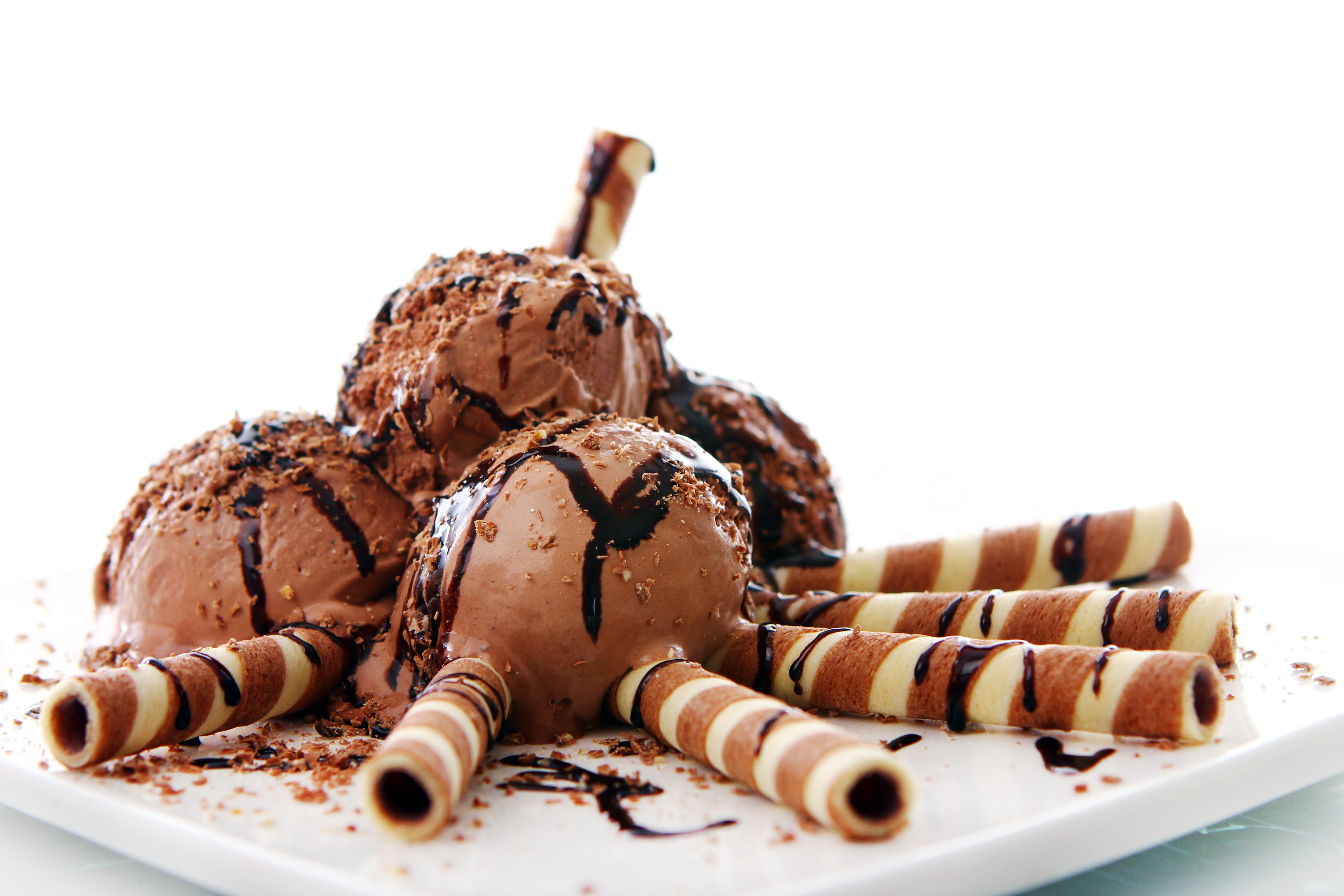Chocolate ice cream with wafer rolls HD Wallpaper