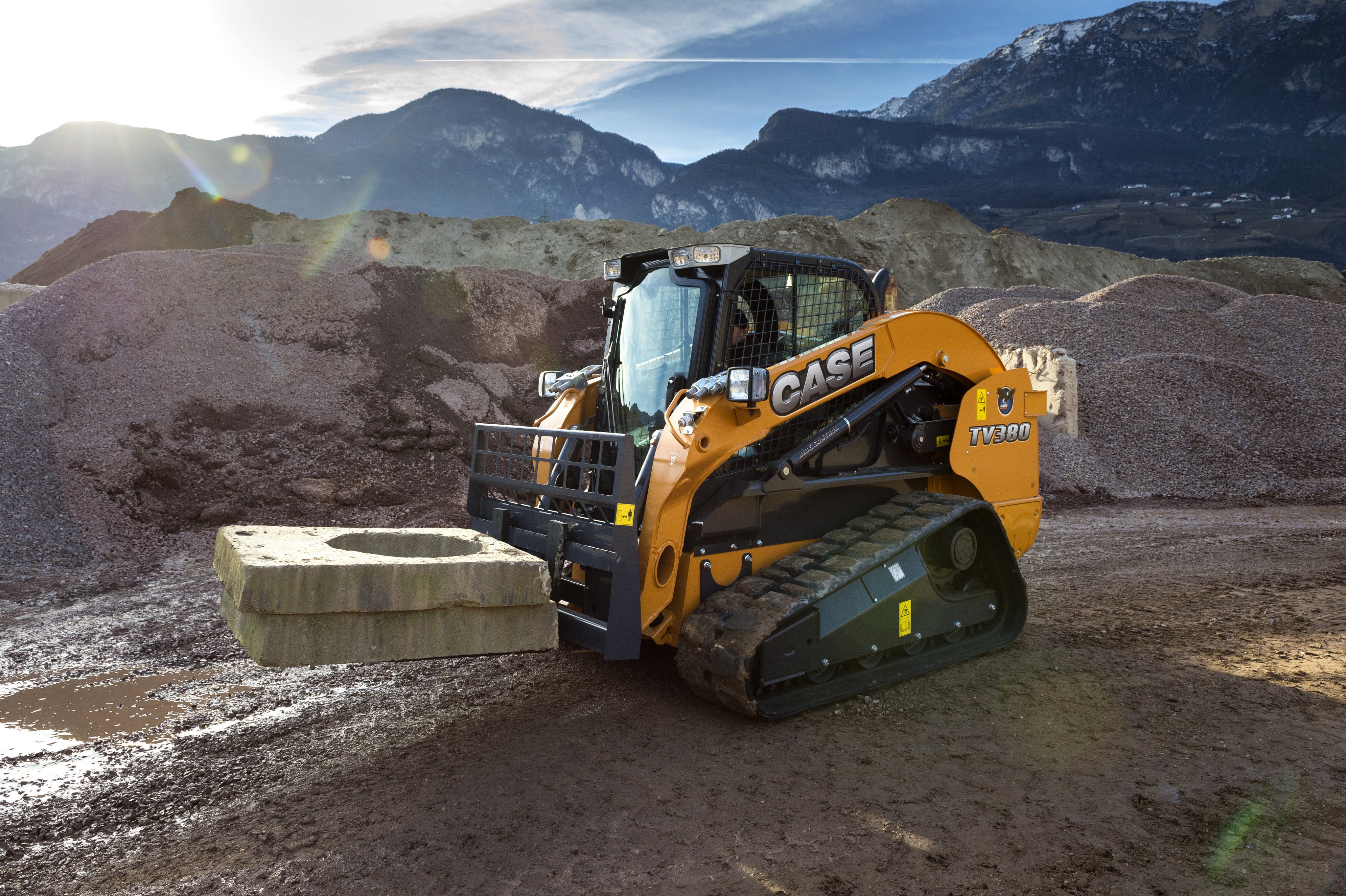 4K Case TV380 skid steer loader with concrete block HD Wallpaper